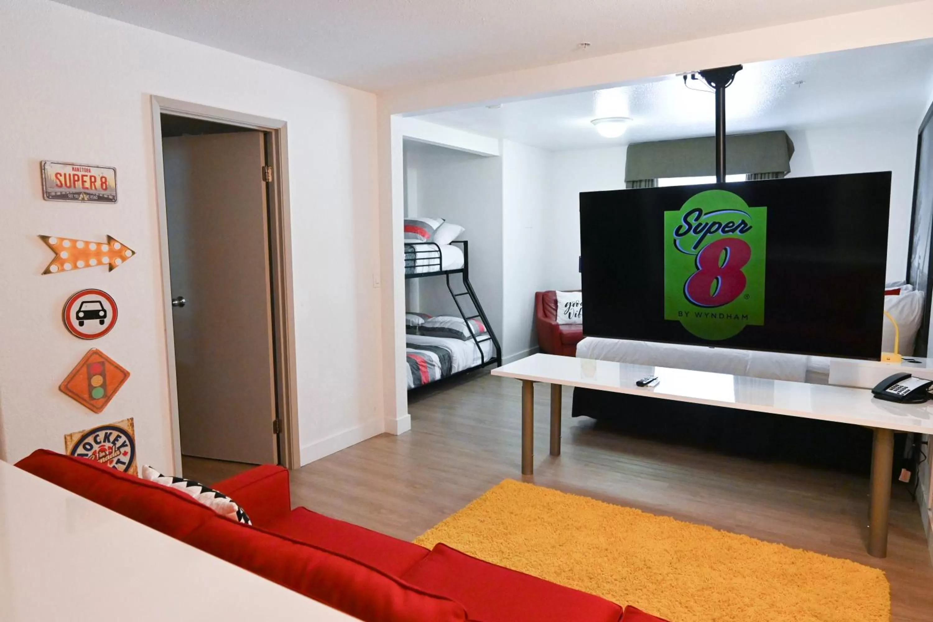 1 King Bed, 1 Twin and 1 Double Bunk Bed, Room 8 Concept Family Ste, Non-Smoking - single occupancy in Super 8 by Wyndham Calgary Shawnessy Area