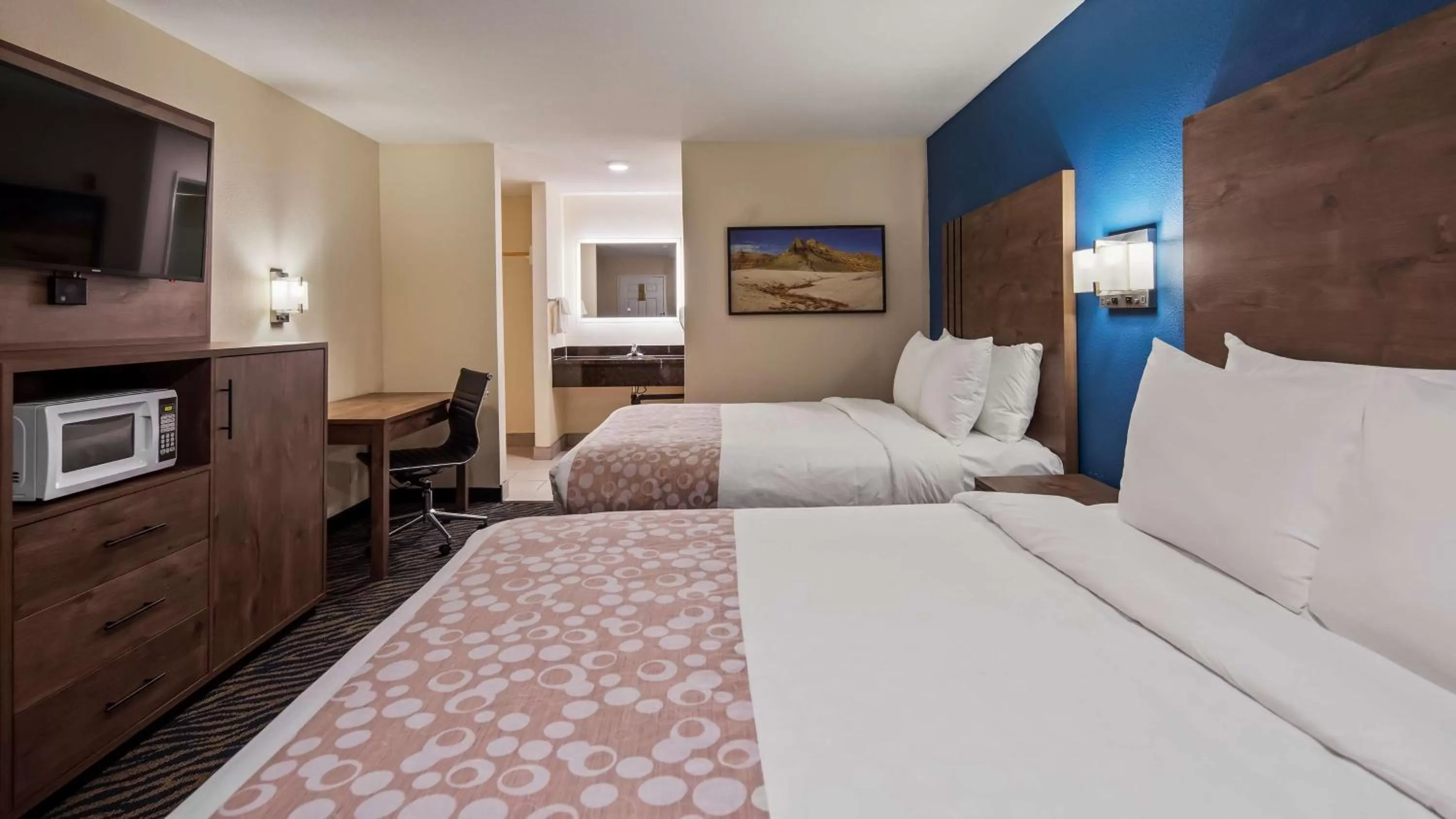 Queen Room with Two Queen Beds - Smoking in SureStay Plus Hotel by Best Western Hesperia