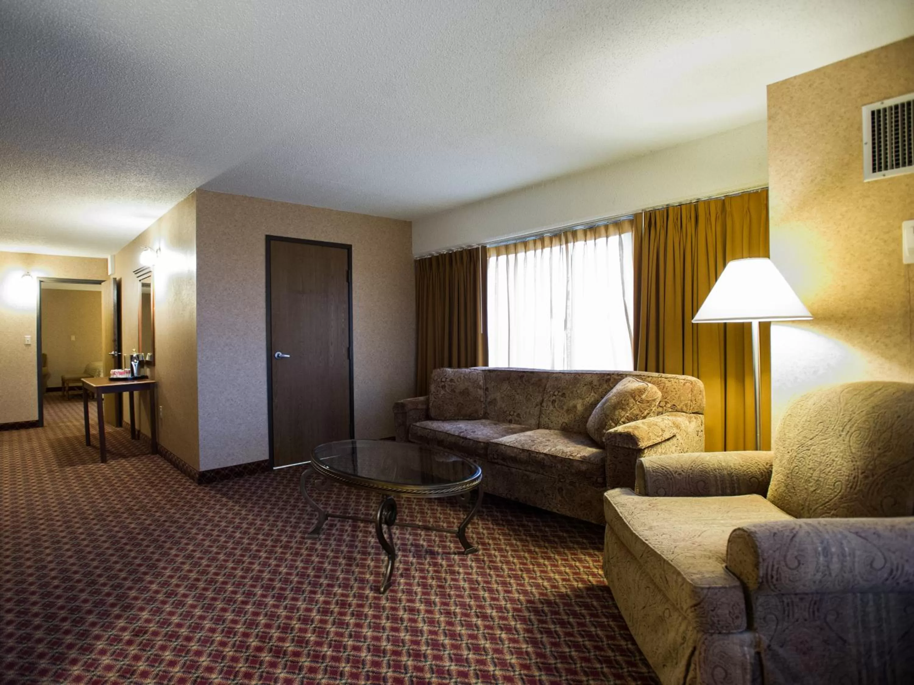 One Bedroom King Suite Non Smoking in Ramada by Wyndham Topeka Downtown Hotel & Convention Center