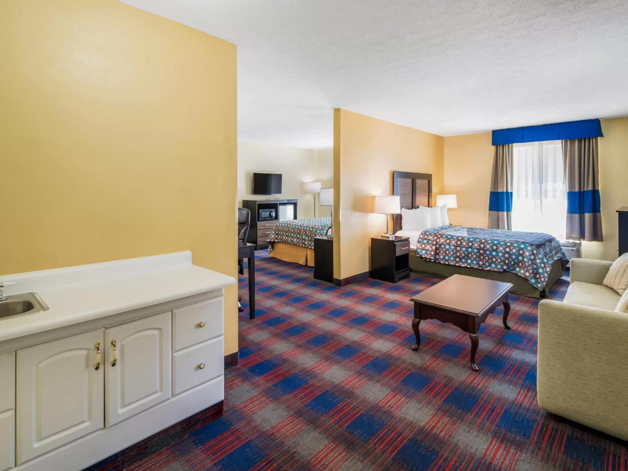 One King Bed One Double Bed Suite in Americas Best Value Inn - Clayton