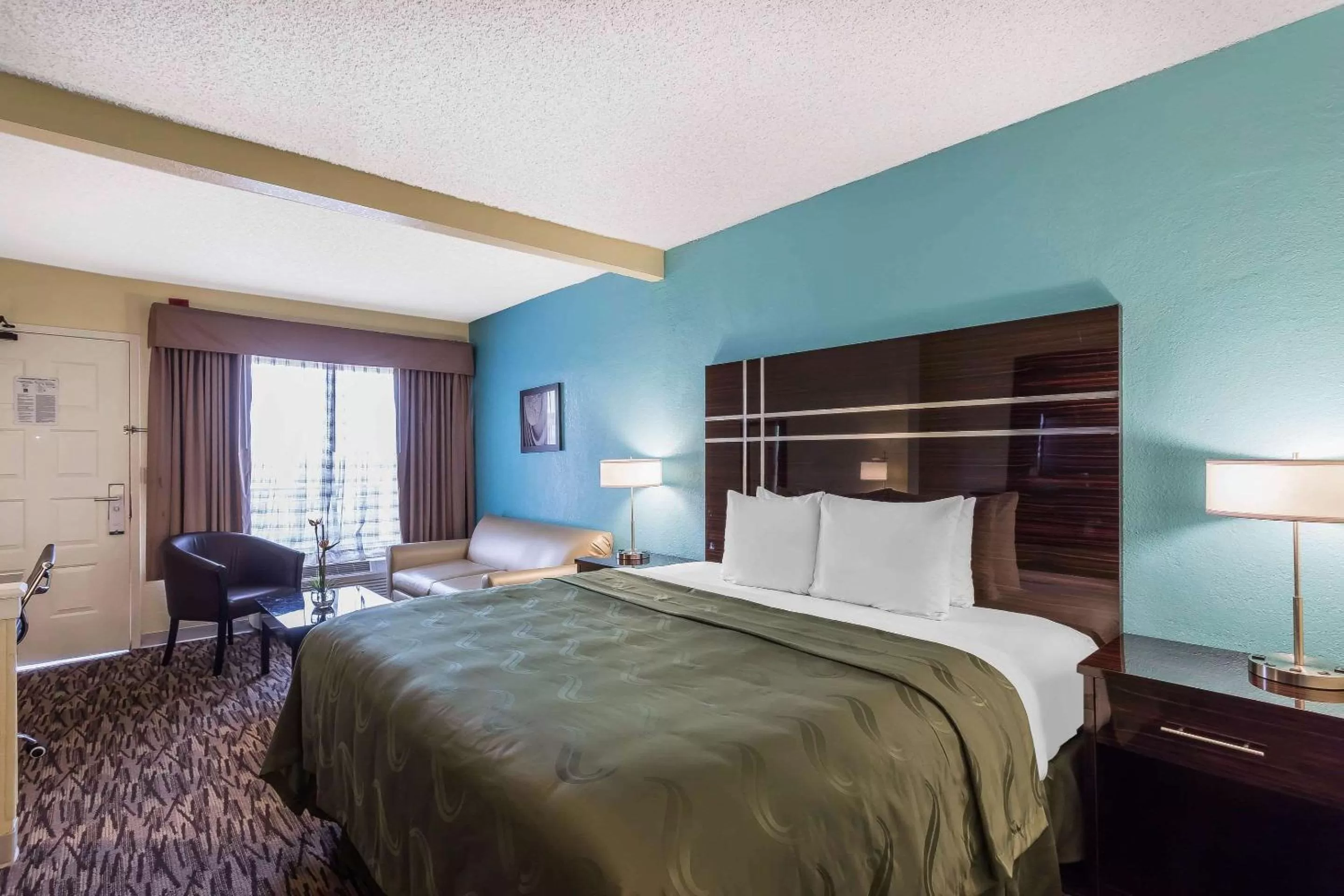 King Suite in Boca Suites Deerfield Beach; SureStay Collection by BW