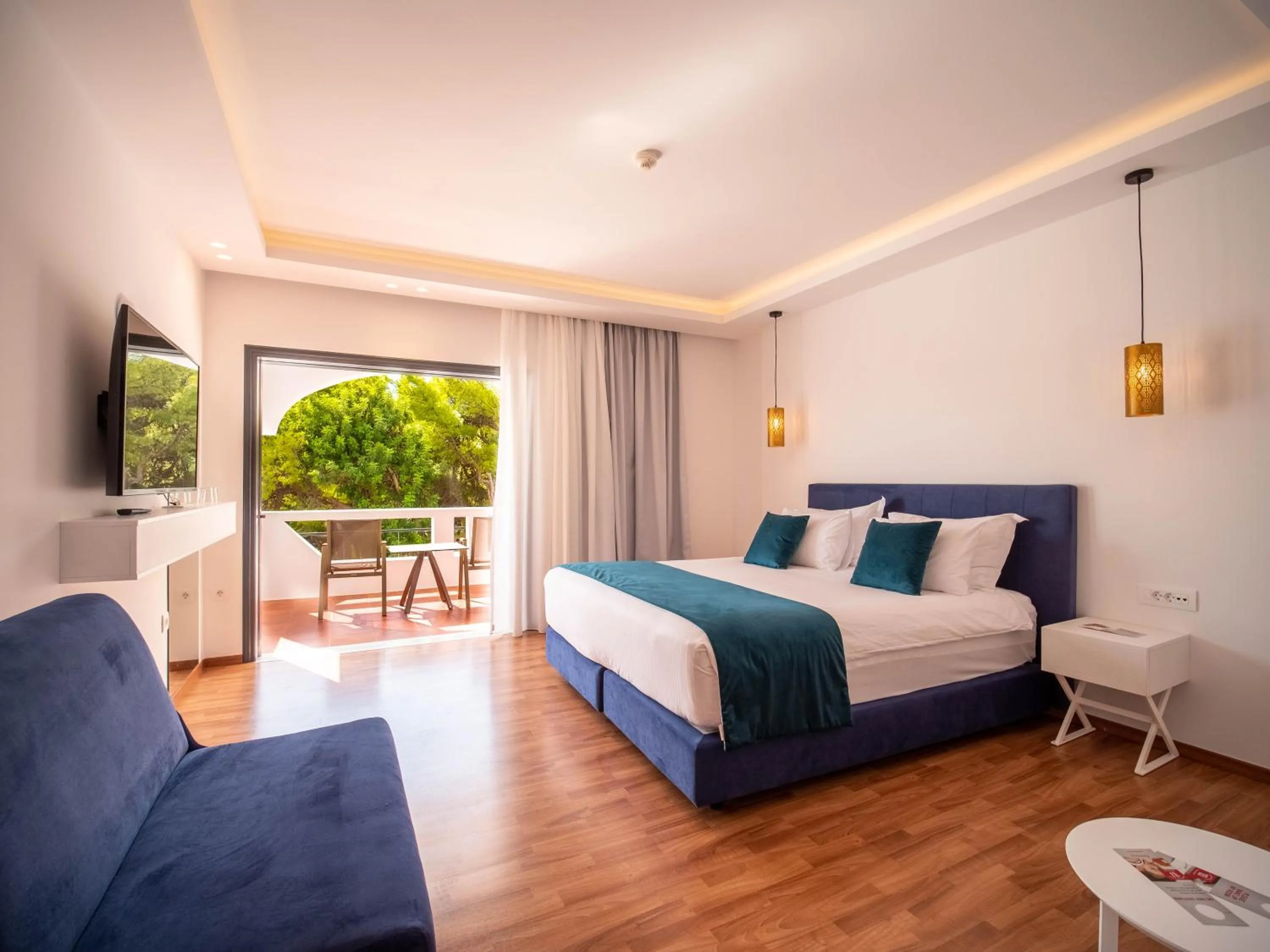 Panorama Suite with Garden View in Ramada Loutraki Poseidon Resort