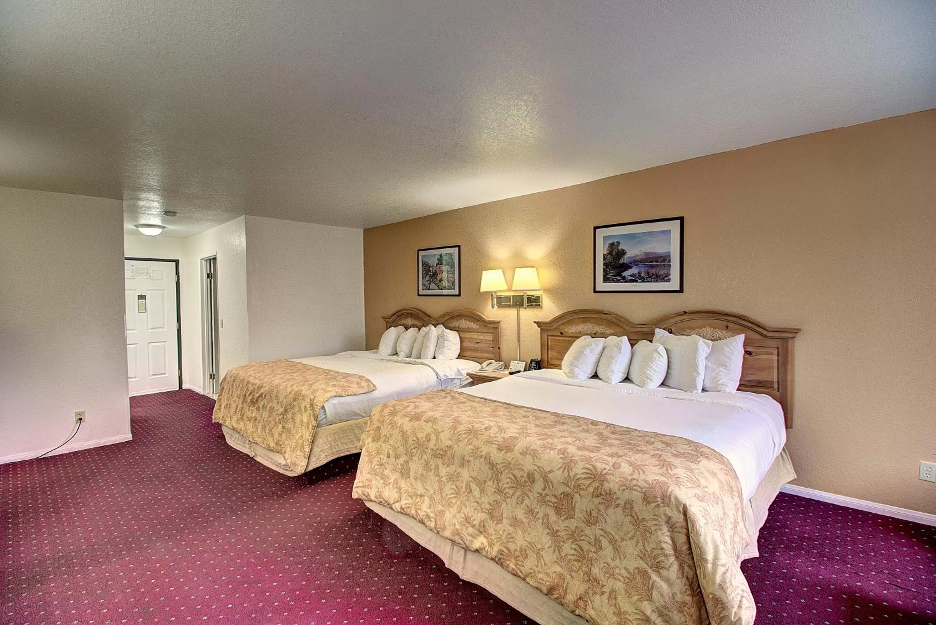 Queen Room with Two Queen Beds - Pet Friendly/Non-Smoking in Days Inn & Suites by Wyndham Lolo