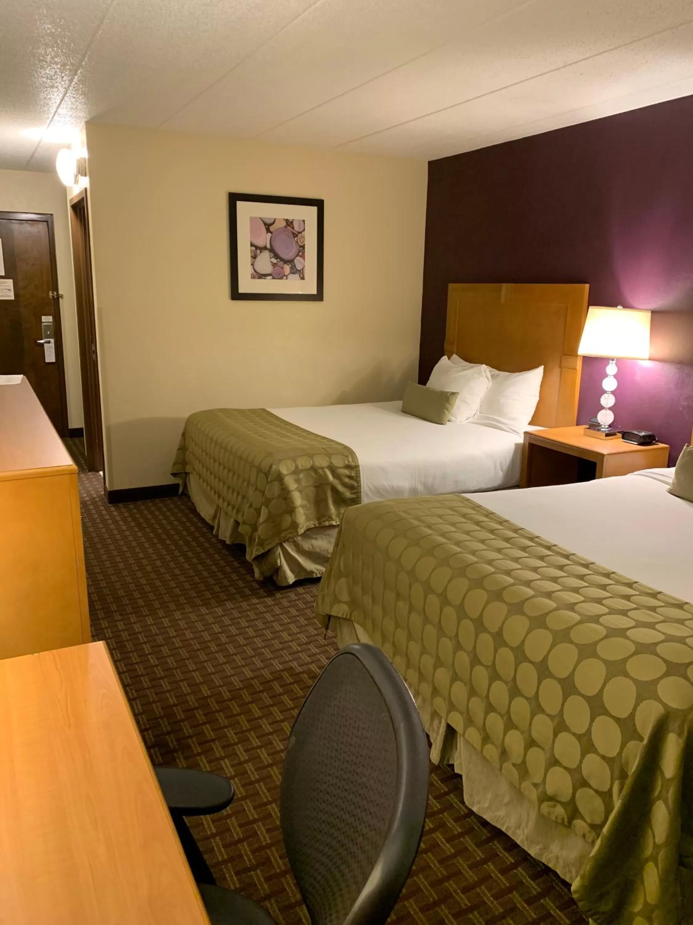 Double Room with Two Double Beds and Pool View - Non-Smoking in Ramada by Wyndham Marquette