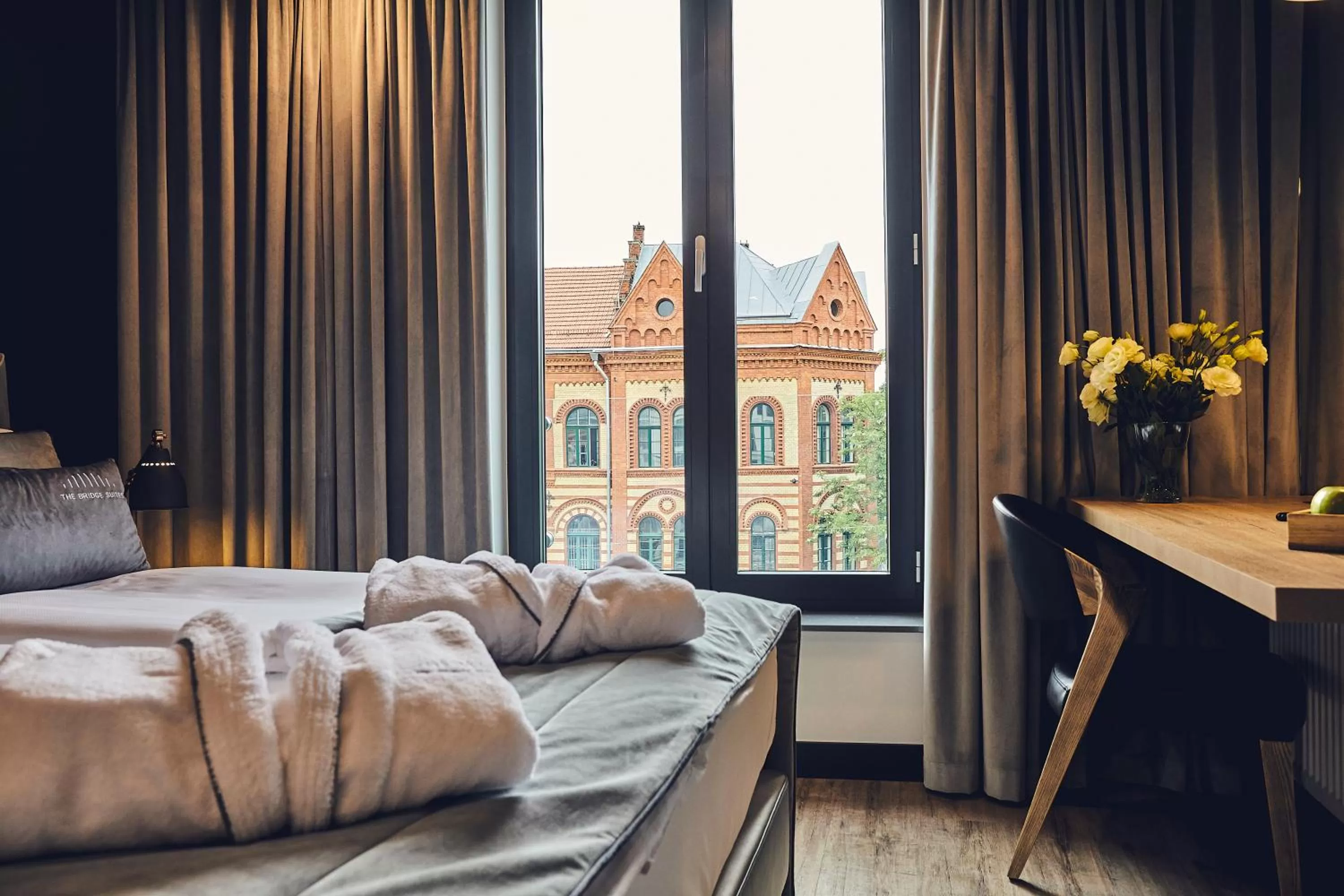 Photo of the whole room, Bed in The Bridge Suites Hotel