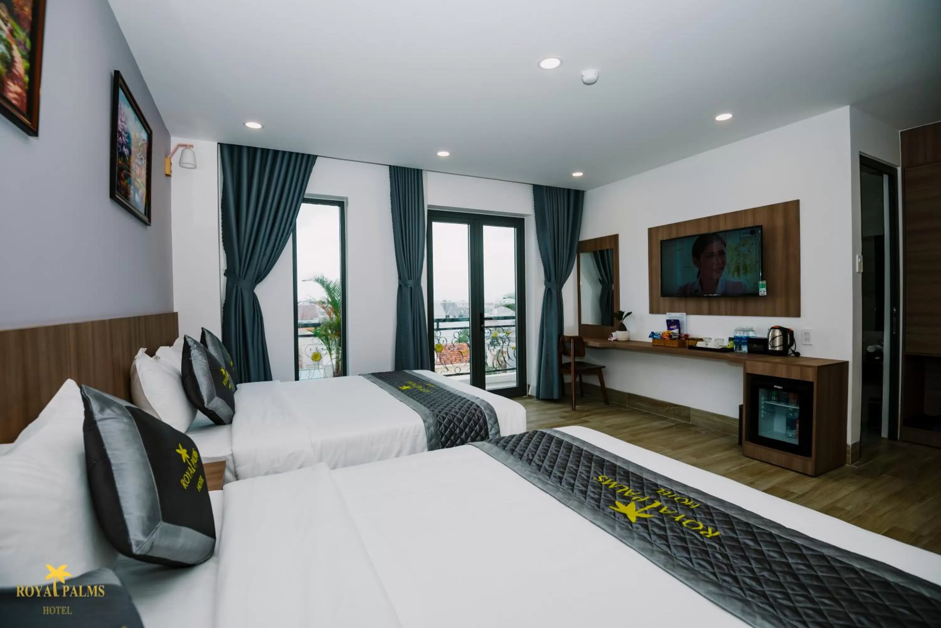 Quadruple Room with Balcony in Royal Palms Hotel