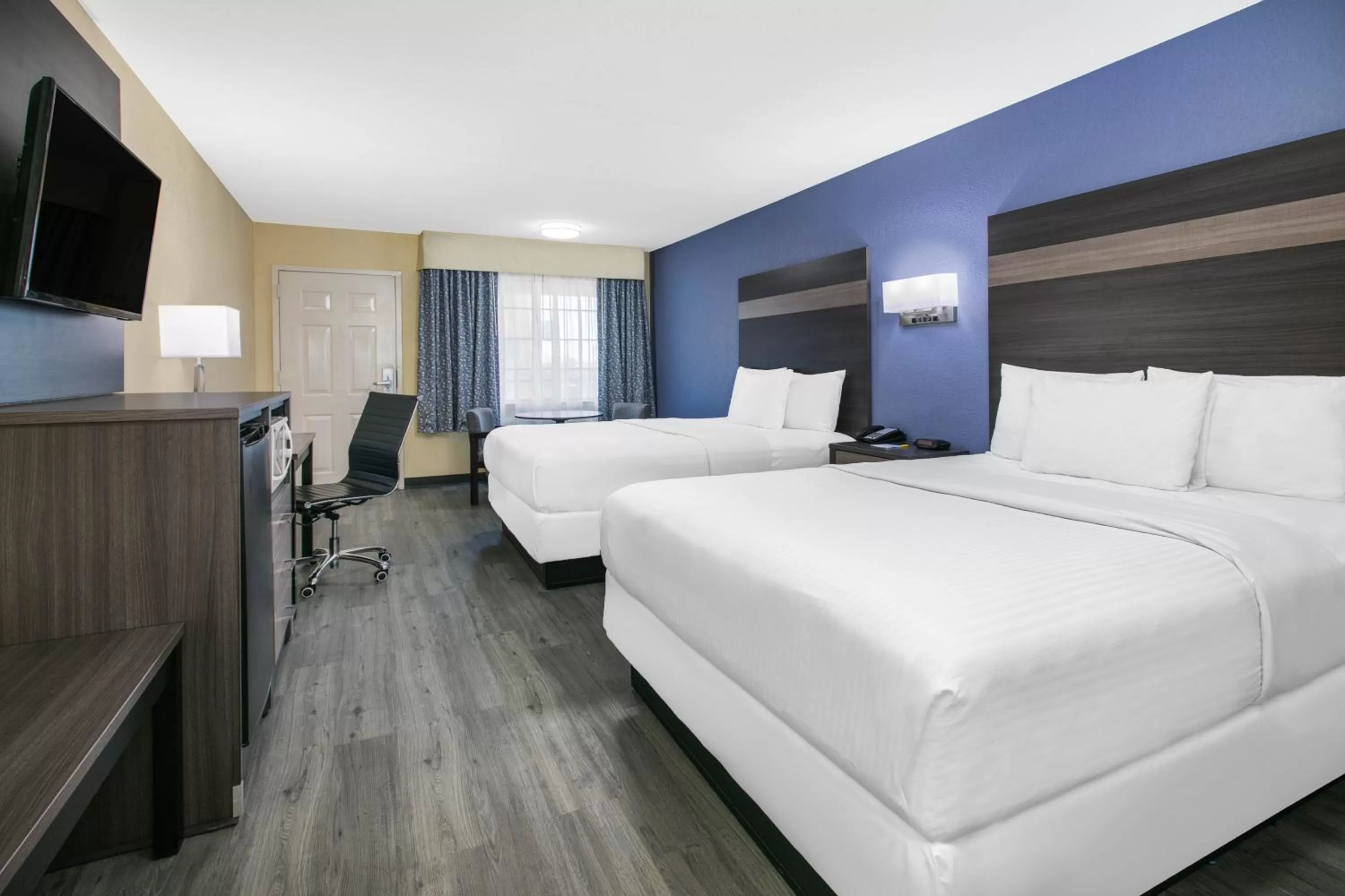 Queen Room with Two Queen Beds - Non-Smoking in Days Inn by Wyndham Waco Near Downtown University