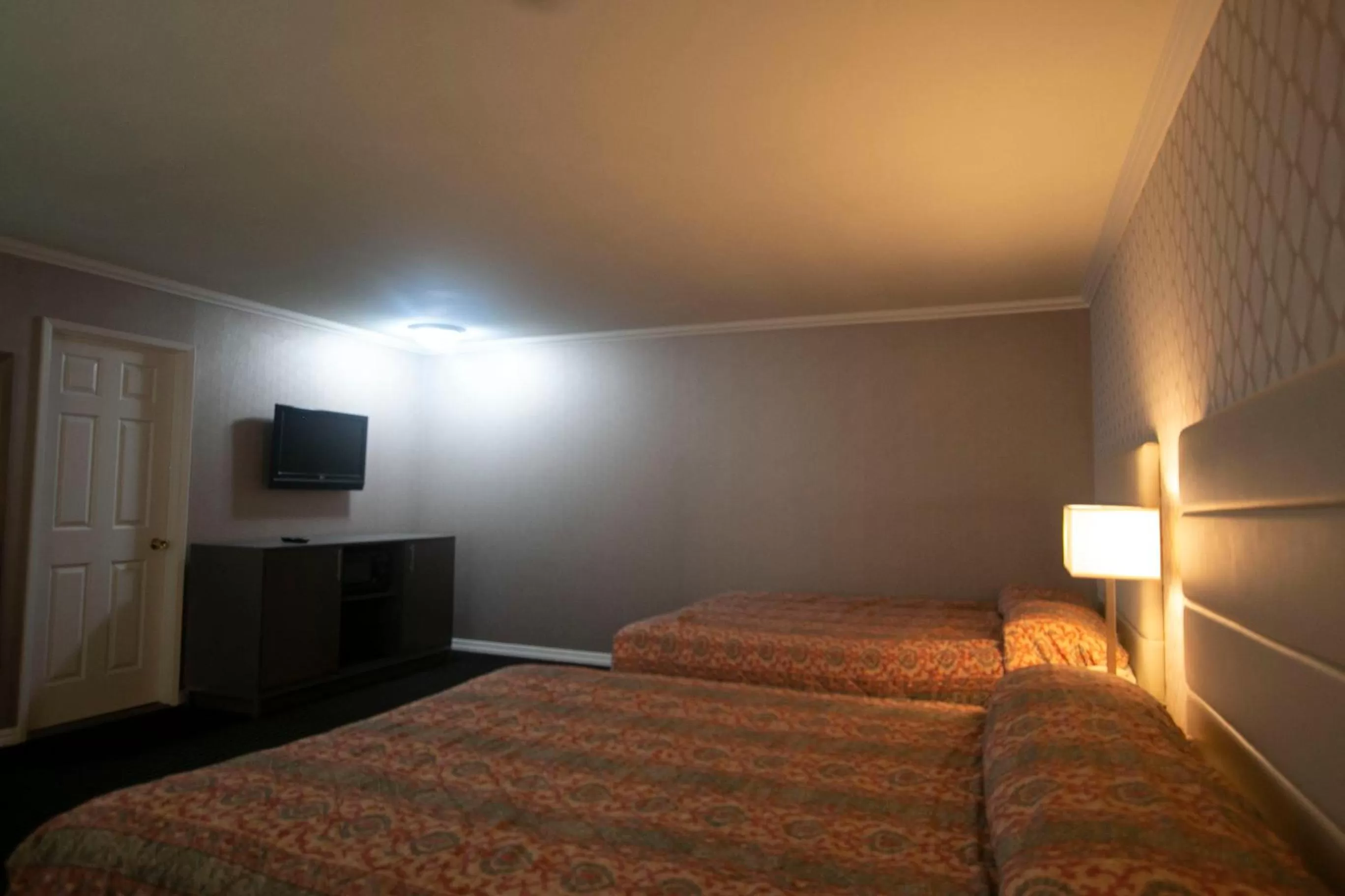 Queen Room with Two Queen Beds in Alpha Inn and Suites