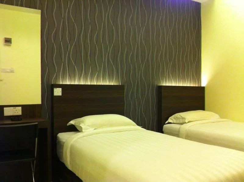 Deluxe Twin Room in The Regency Garden Hotel
