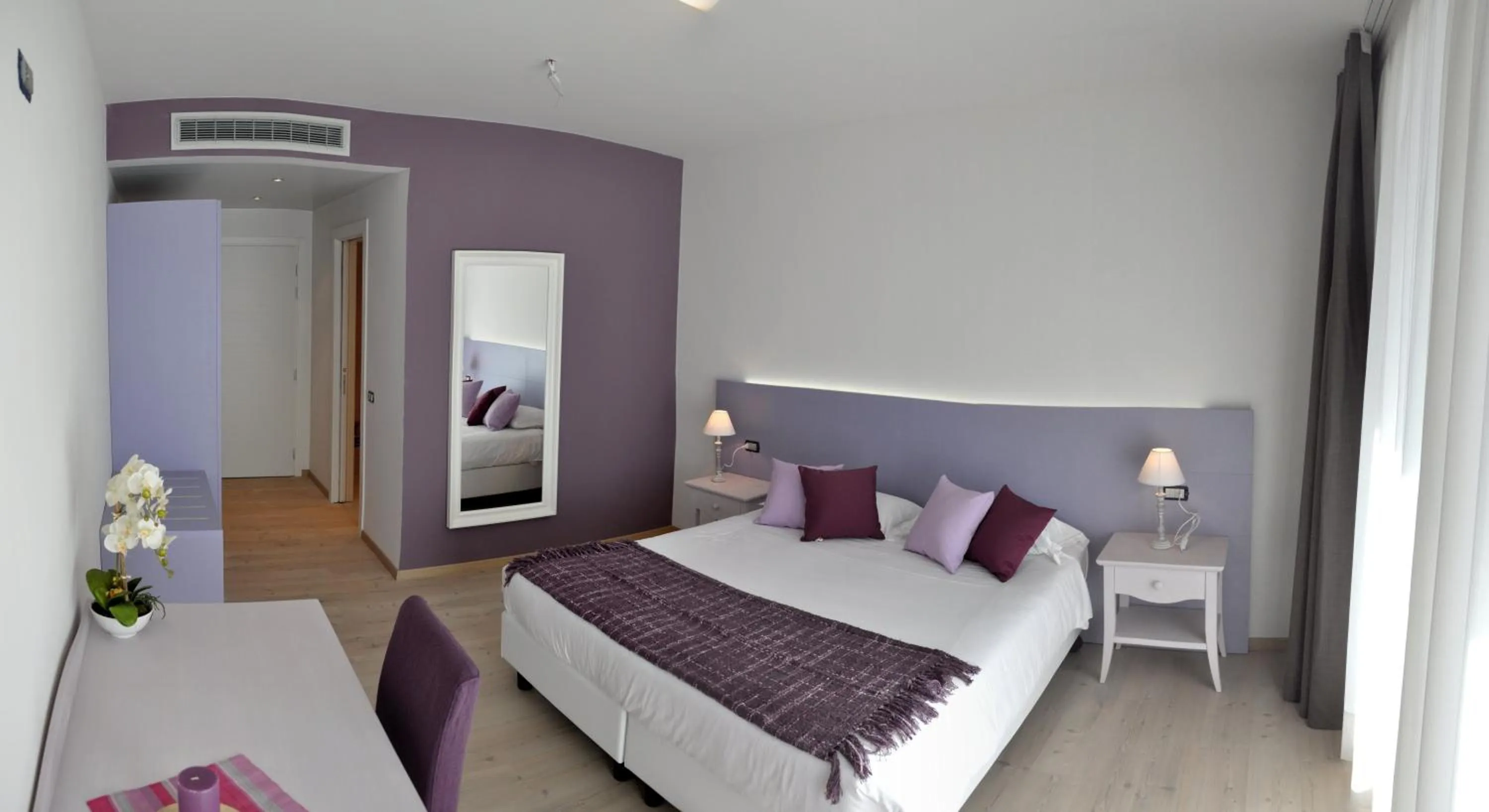 Double or Twin Room with Lateral Lake View in Tullio Hotel