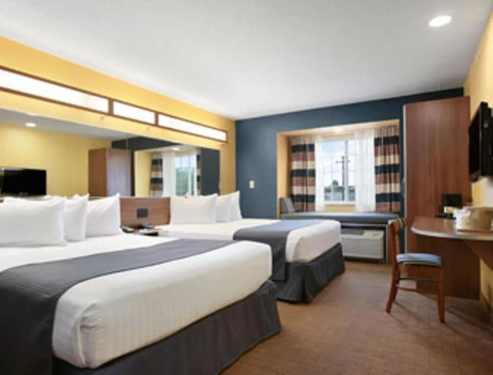 Queen Room with Two Queen Beds - Non-Smoking in Microtel Inn & Suites Chili/Rochester