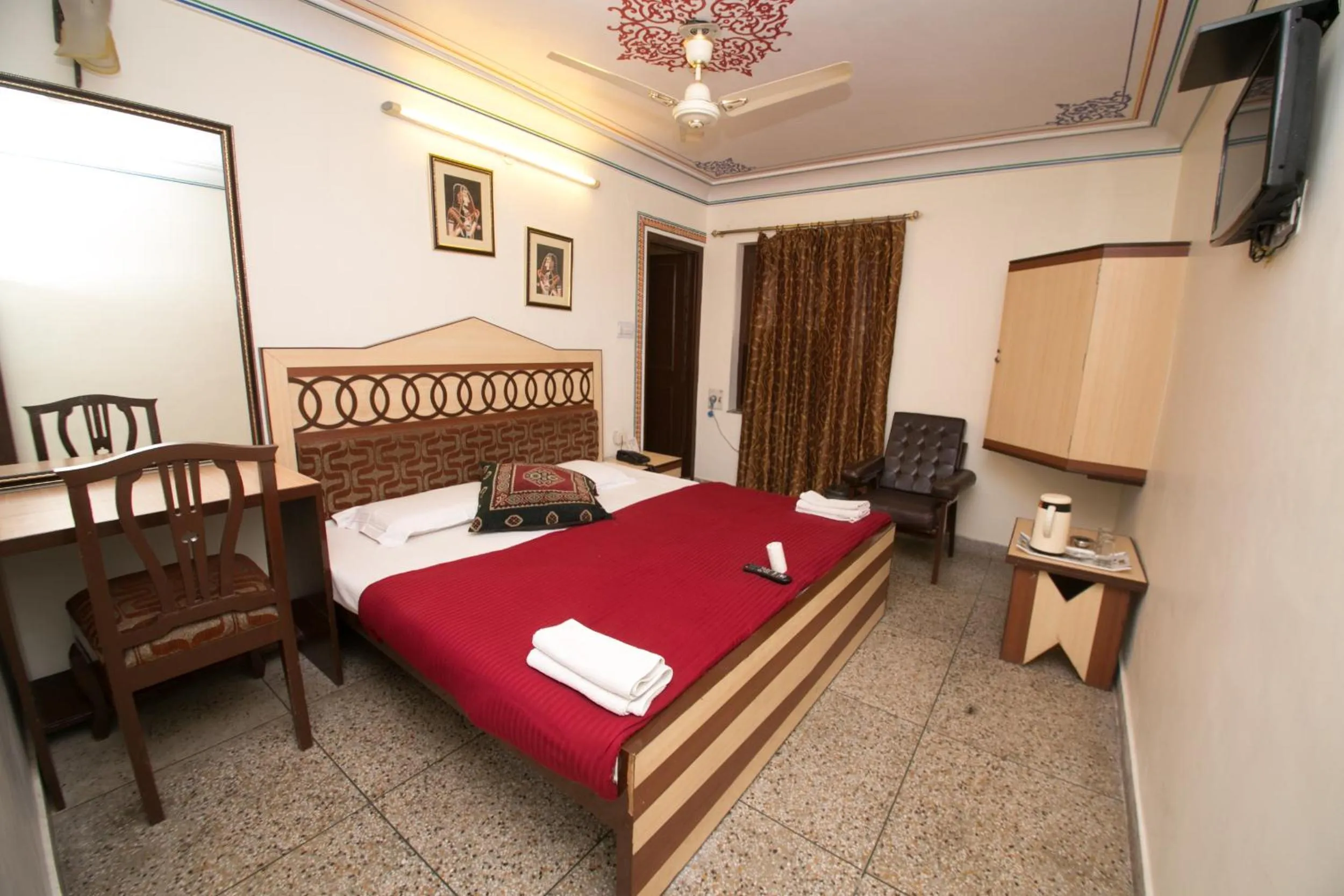 Semi Deluxe Double Room with Fan - 10% off on SURA Cocktails & Cuisines, Enjoy Live Music, Welcome Drink on Arrival and Free Pickup from Railway Station in Hotel Kalyan