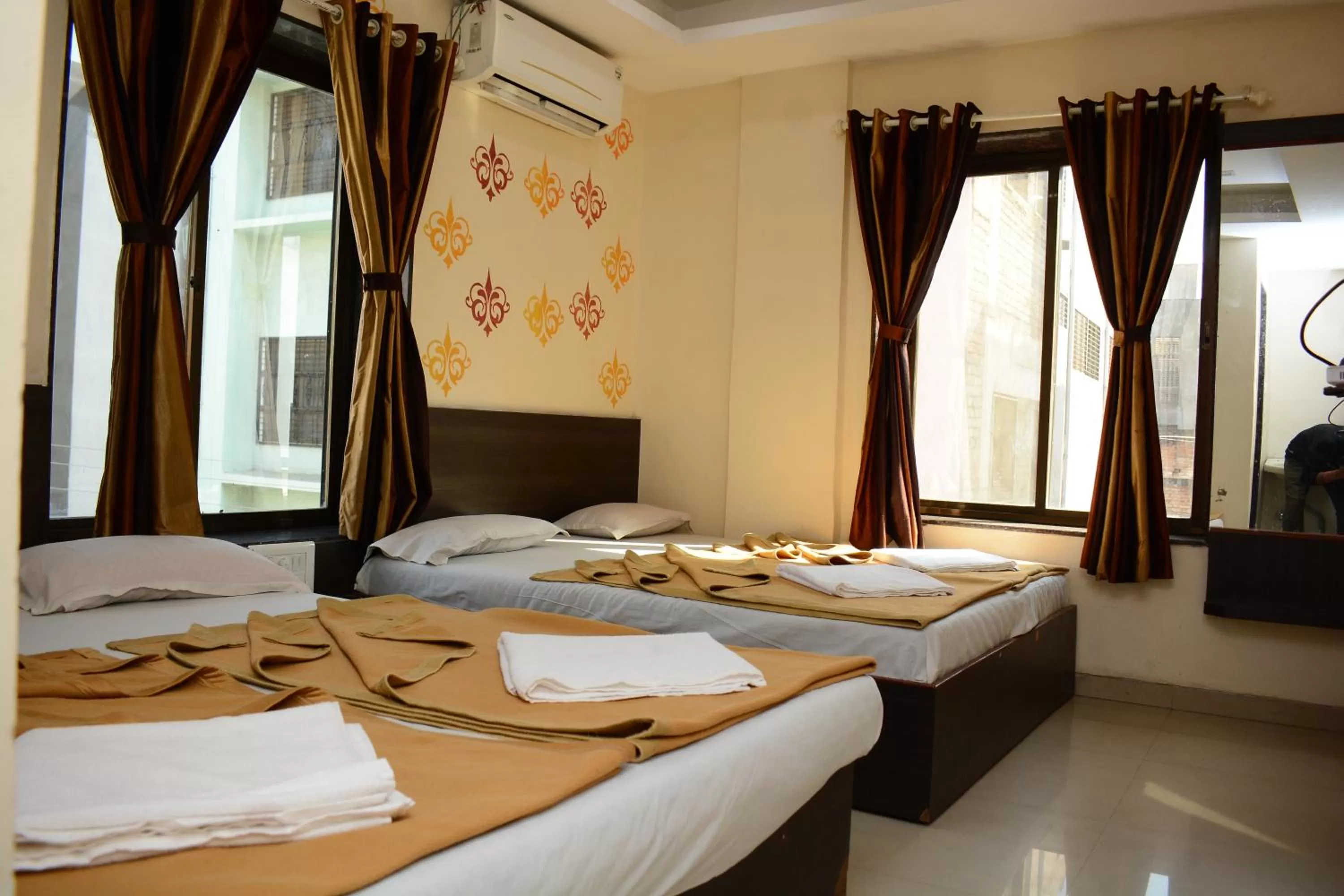 Standard Quadruple Room in Hotel Sai Sampada NX
