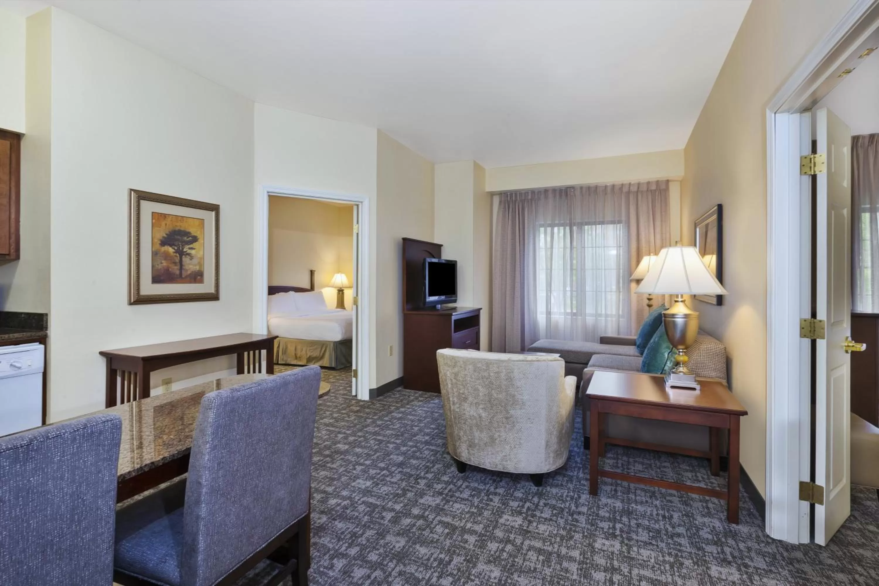 Two-Bedroom Suite with One King, Two Queen and Sofa Bed in Staybridge Suites Lansing-Okemos by IHG