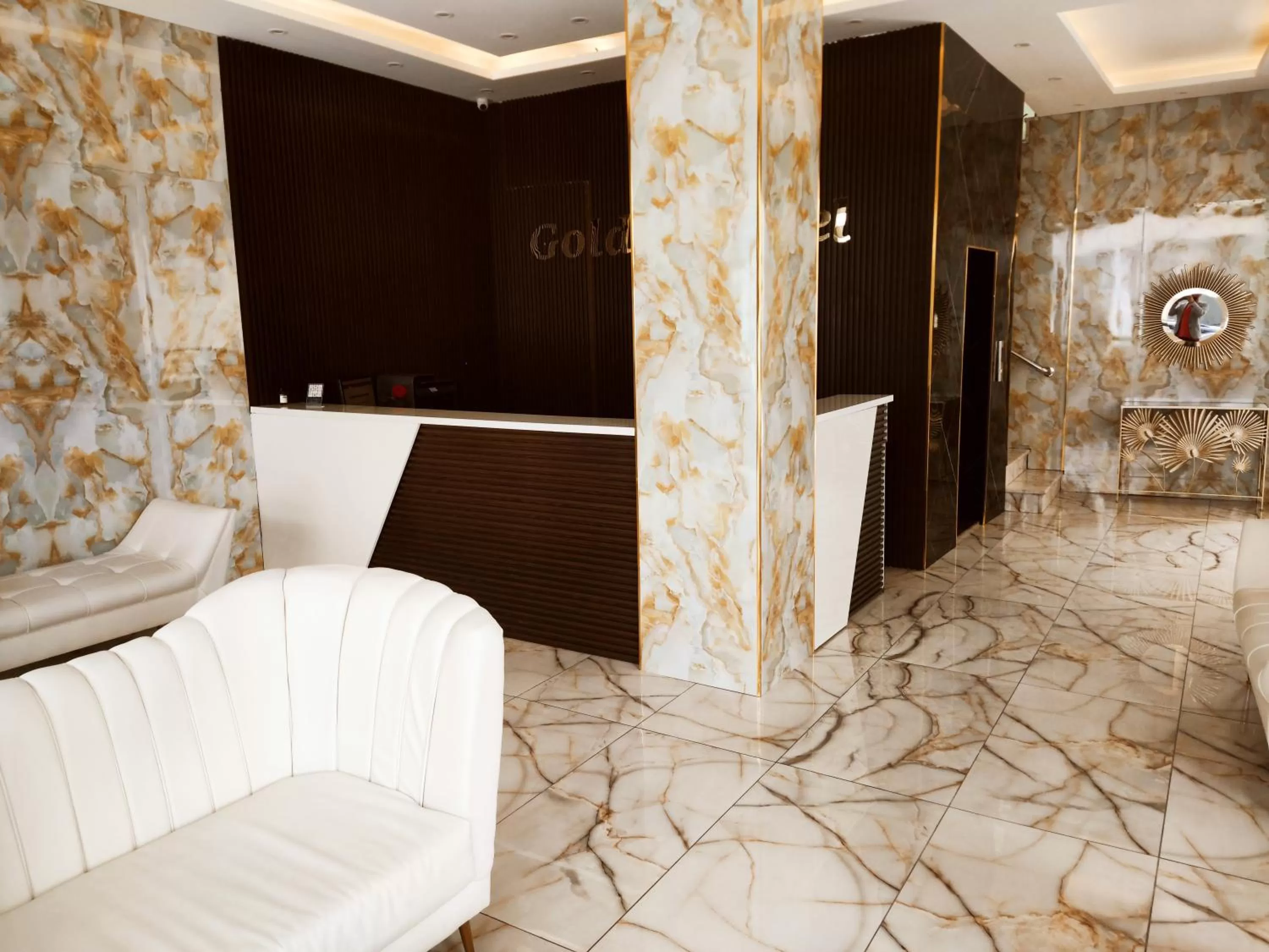 Lobby or reception in Golden Plaza Hotel