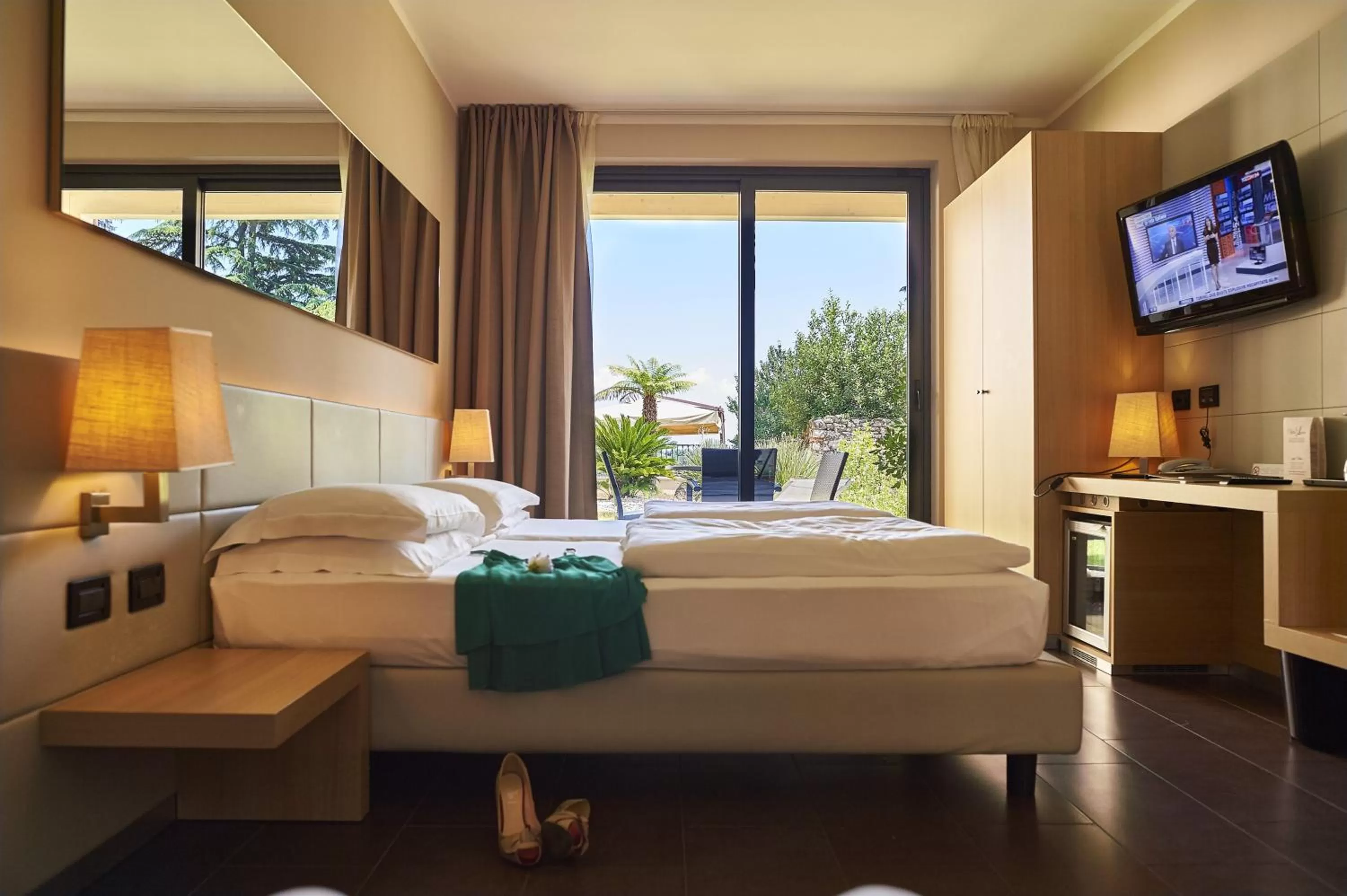 Comfort Triple/Quadruple Room with Garden  in Villa Luisa Resort & Luxury Apartments