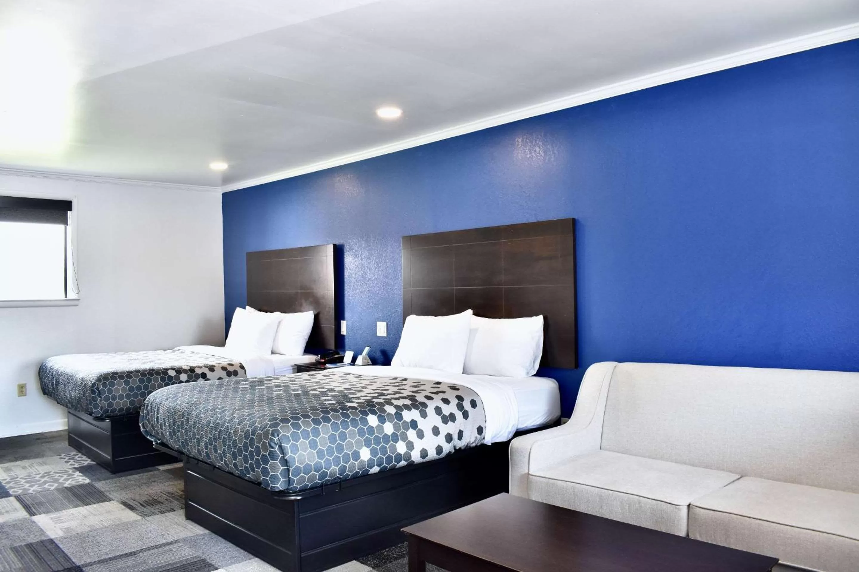 Queen Room with Two Queen Beds and Sofa Bed - Smoking in Rodeway Inn Swainsboro