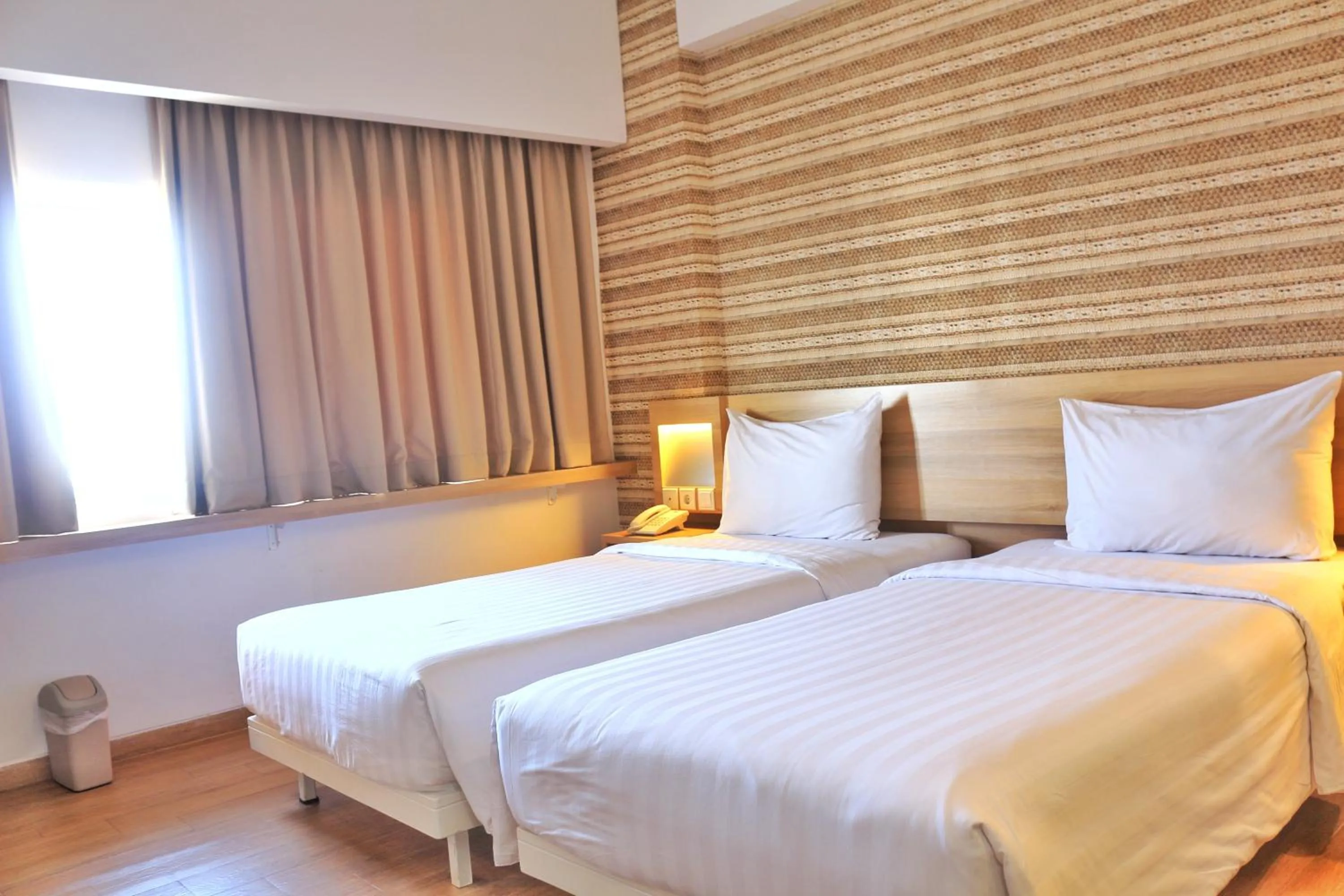 Deluxe Twin Room in Whiz Prime Hotel Basuki Rahmat Malang