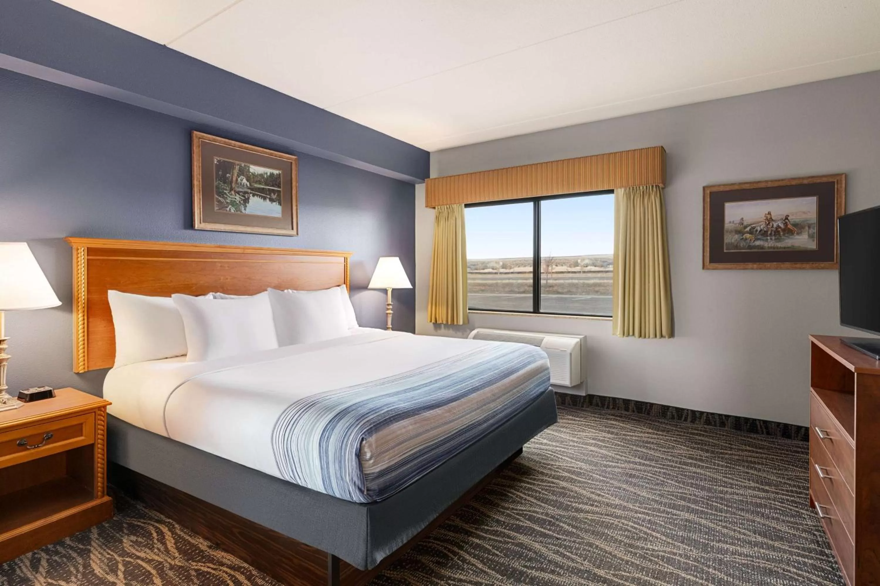 Deluxe King Room - Mobility Access/Non-Smoking in AmericInn by Wyndham Laramie Near University of Wyoming