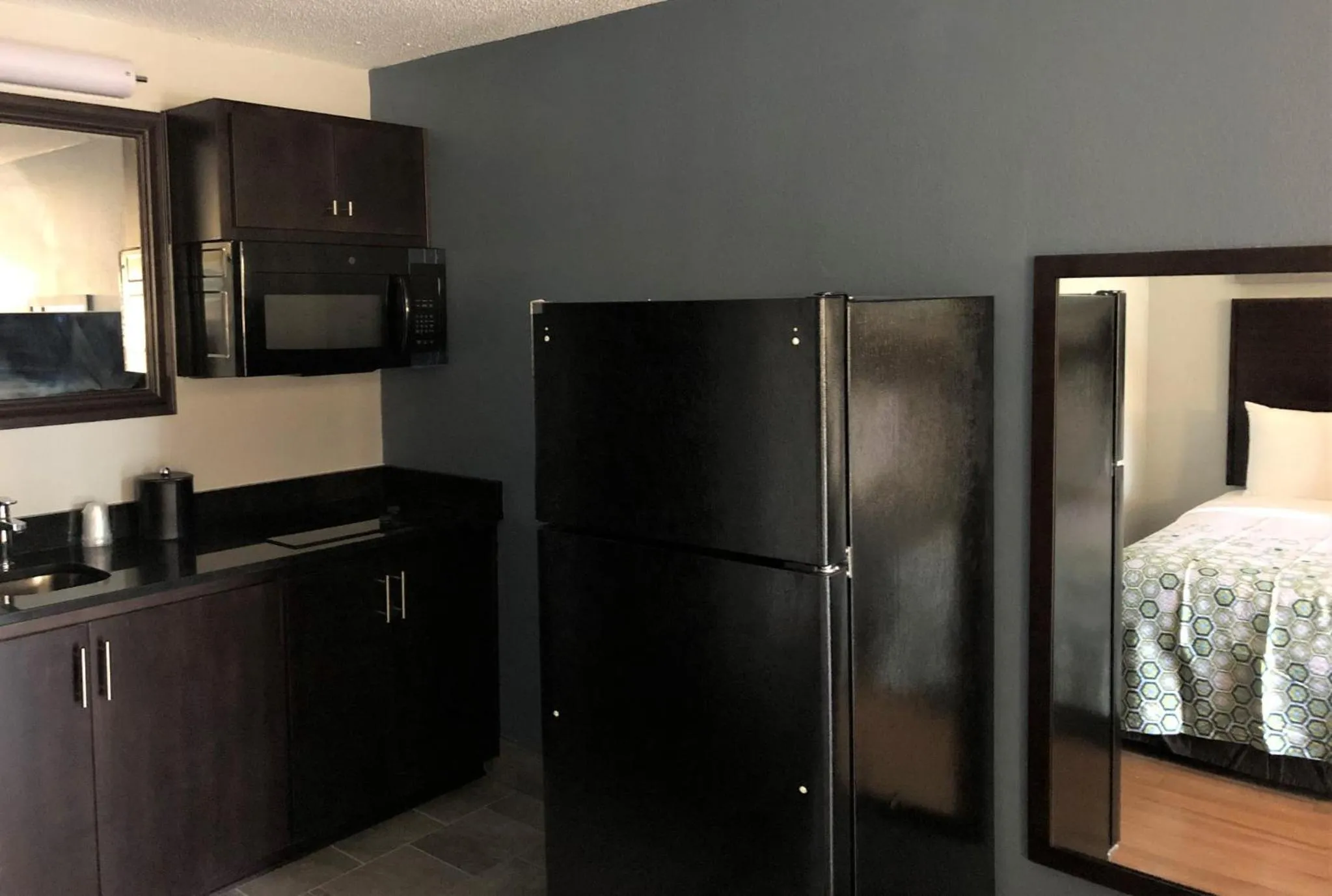 Studio King Room Disability Access Roll-In Shower Non-Smoking in HomeTowne Studios by Red Roof Augusta