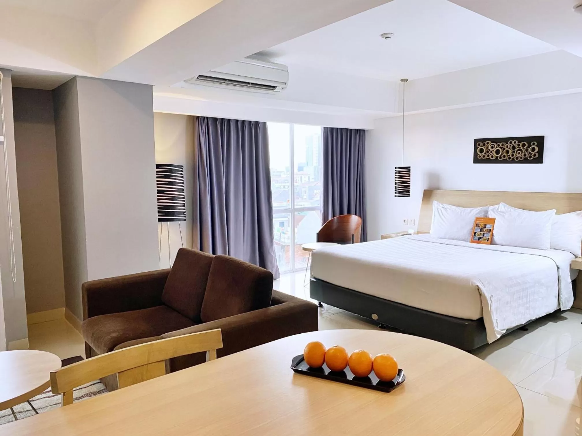 Junior Suite in Harper MT Haryono by ASTON