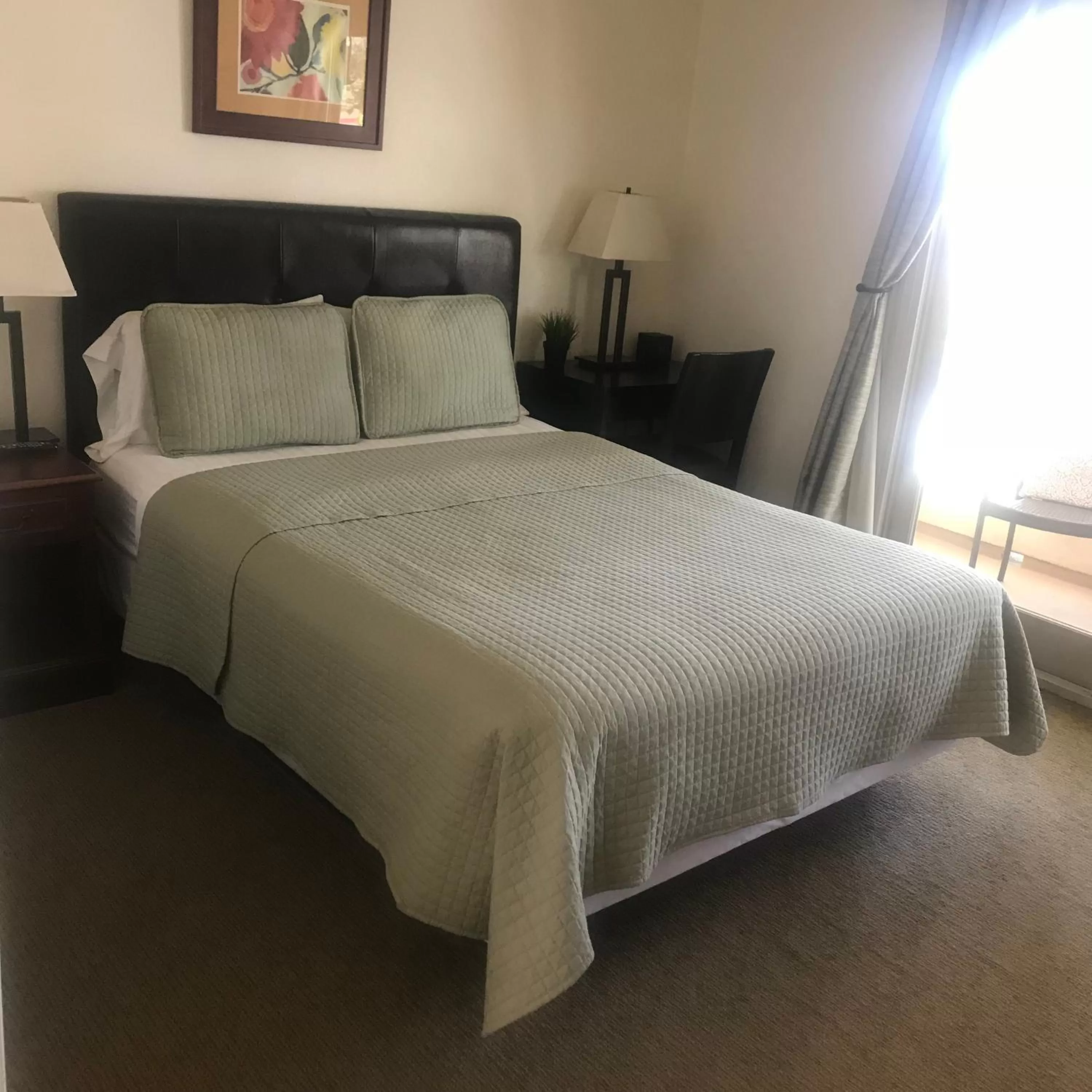Queen Room with Balcony - single occupancy in Bella Capri Inn and Suites