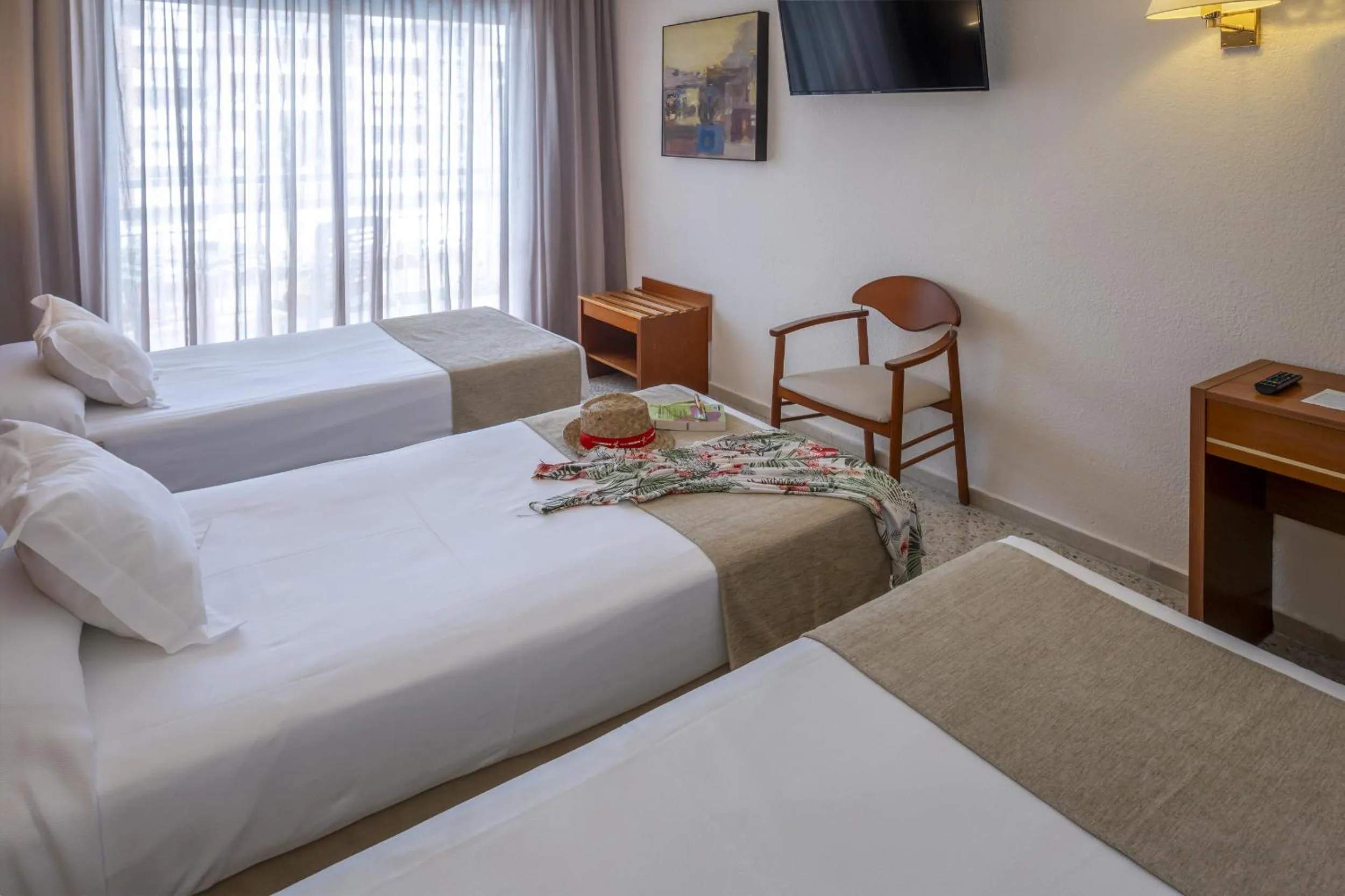 Twin Room with Extra Bed and Balcony (2 Adults + 1 Child) in GHT Oasis Park & Spa