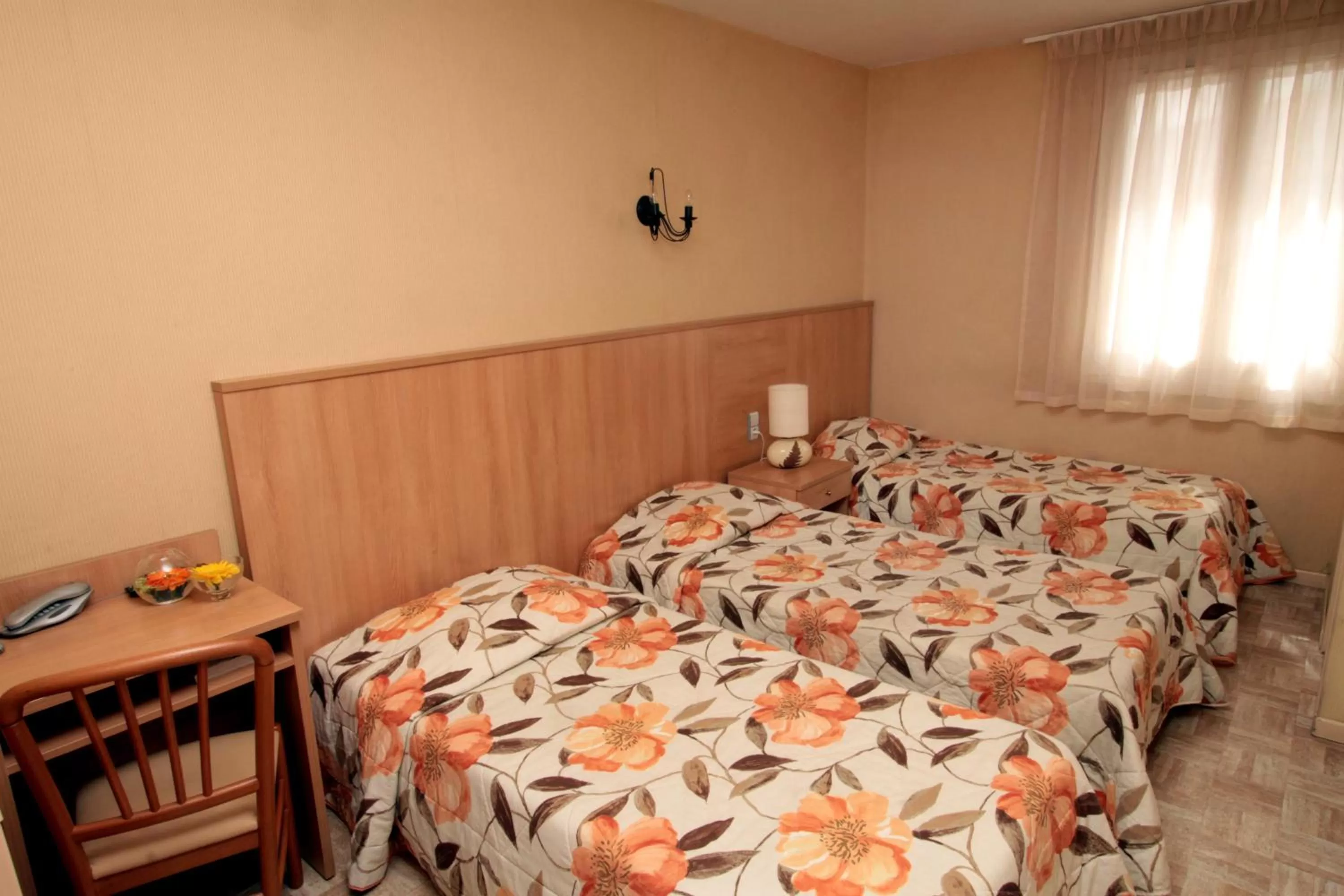 Comfort Triple Room in Hotel de La Paix