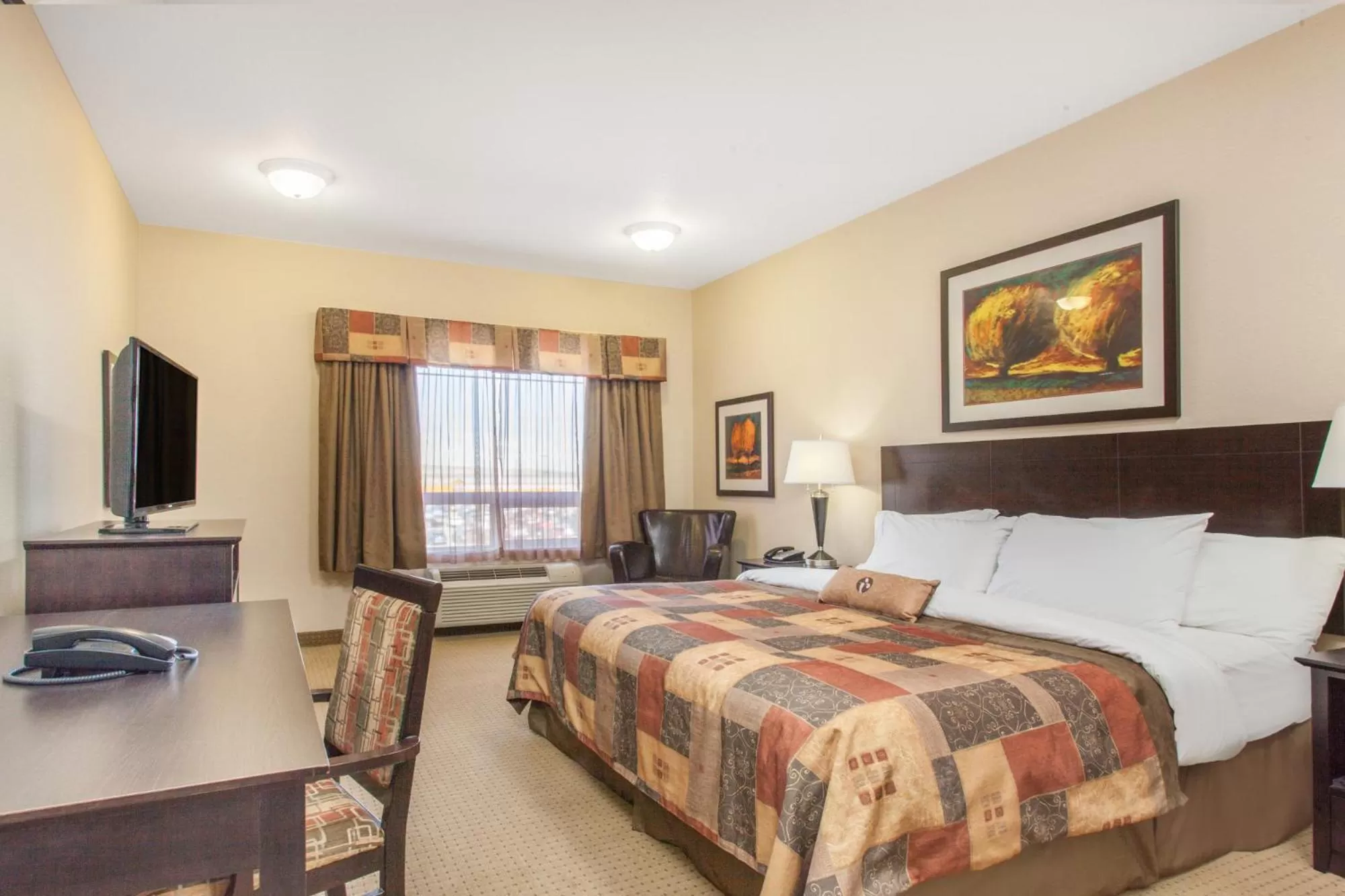 Deluxe King Room - Non-Smoking in Ramada by Wyndham Pincher Creek