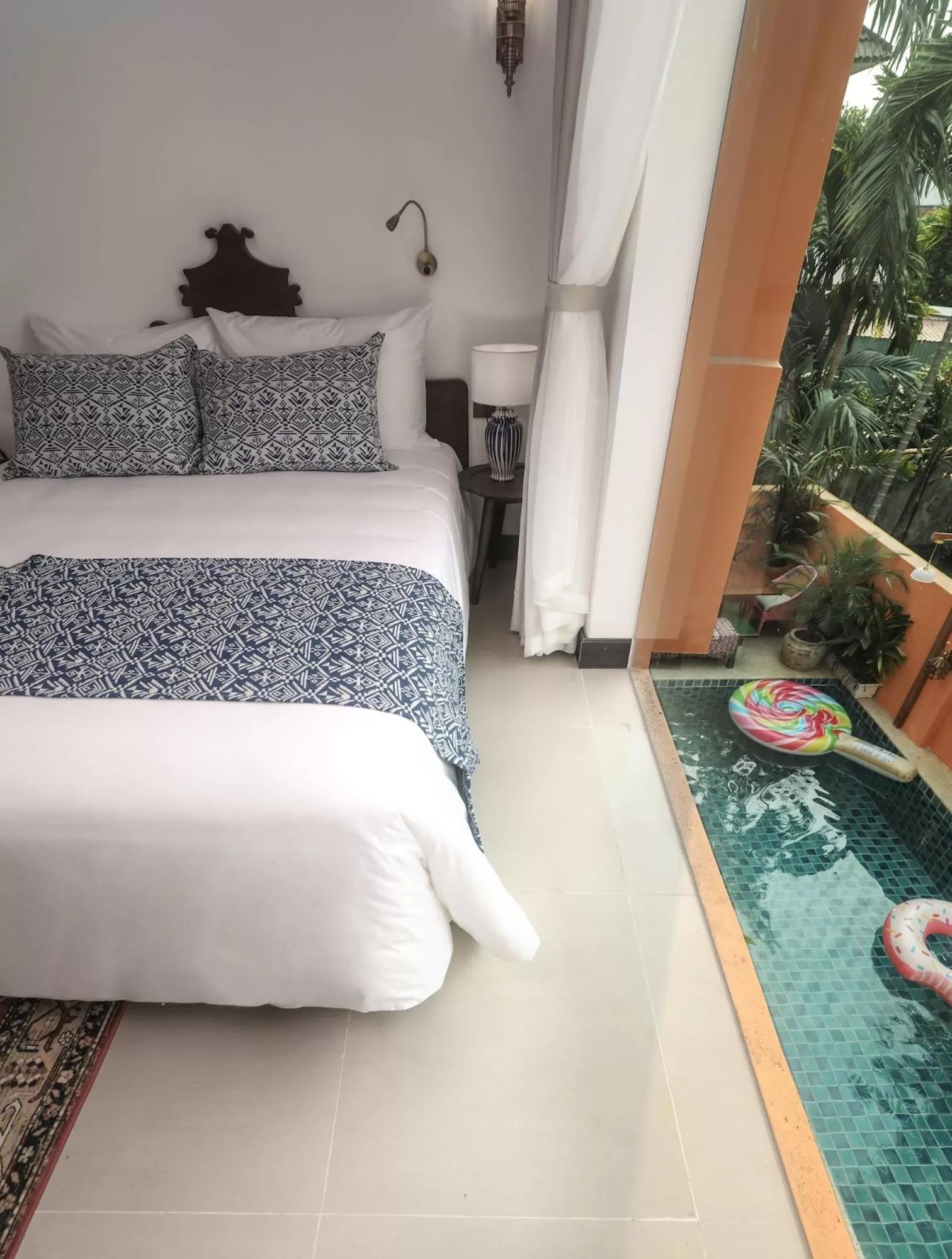 Family Room with Bathtub and Pool Garden View in The Mansion Hoi An by Minova