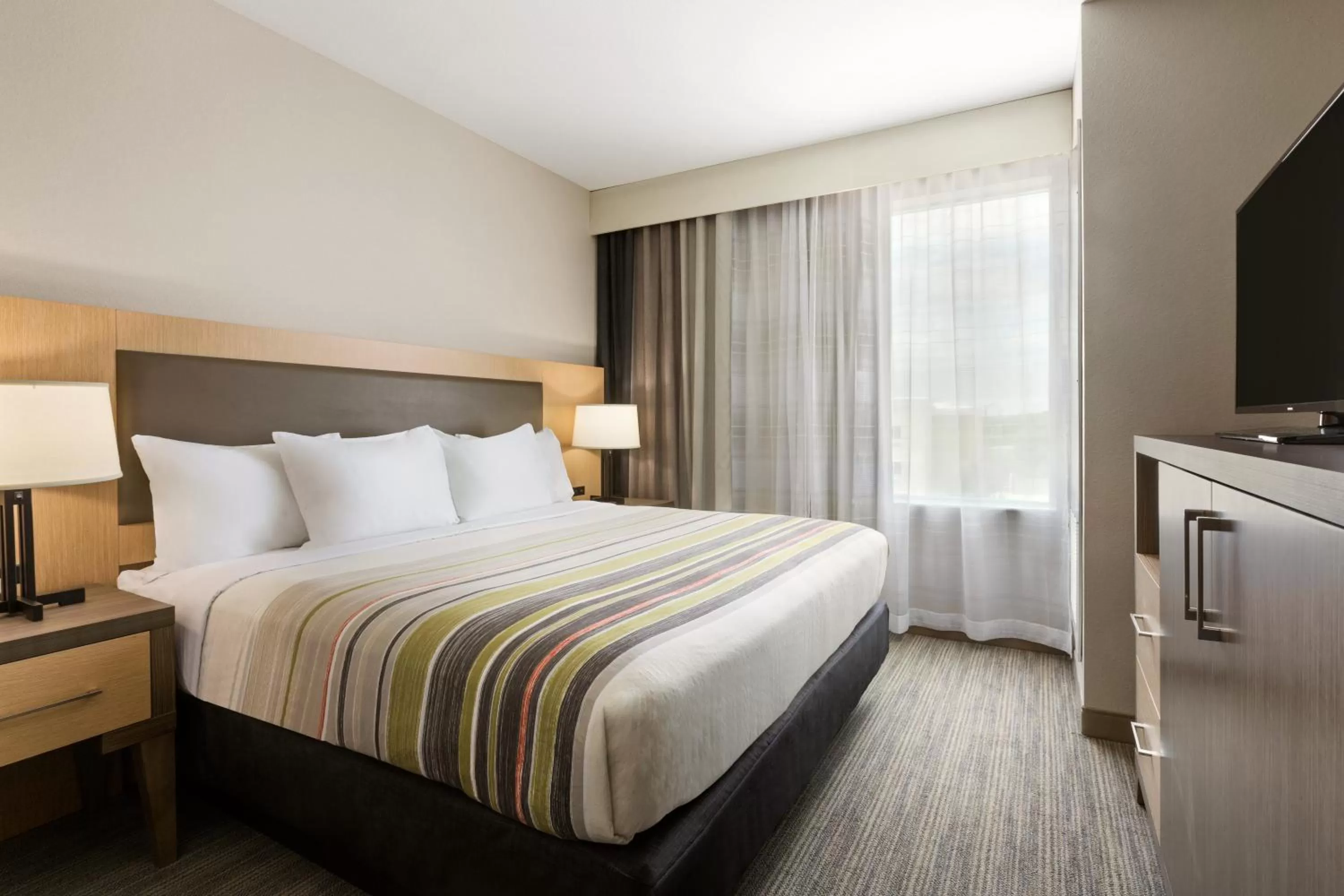King Suite in Country Inn & Suites by Radisson, New Braunfels, TX