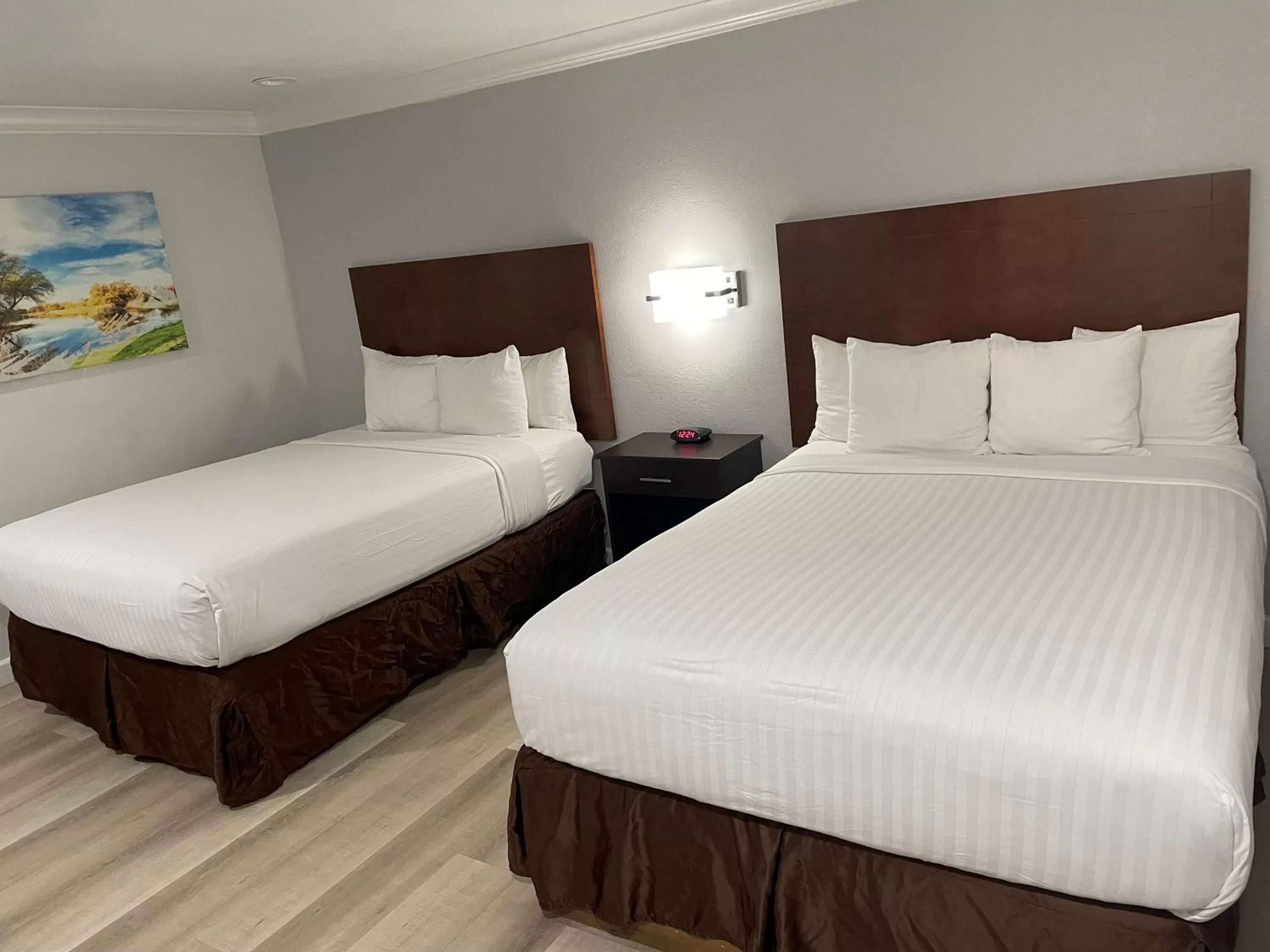 Queen Room with Two Queen Beds and Mobility Accessible Roll-In Shower in Best Western Inn