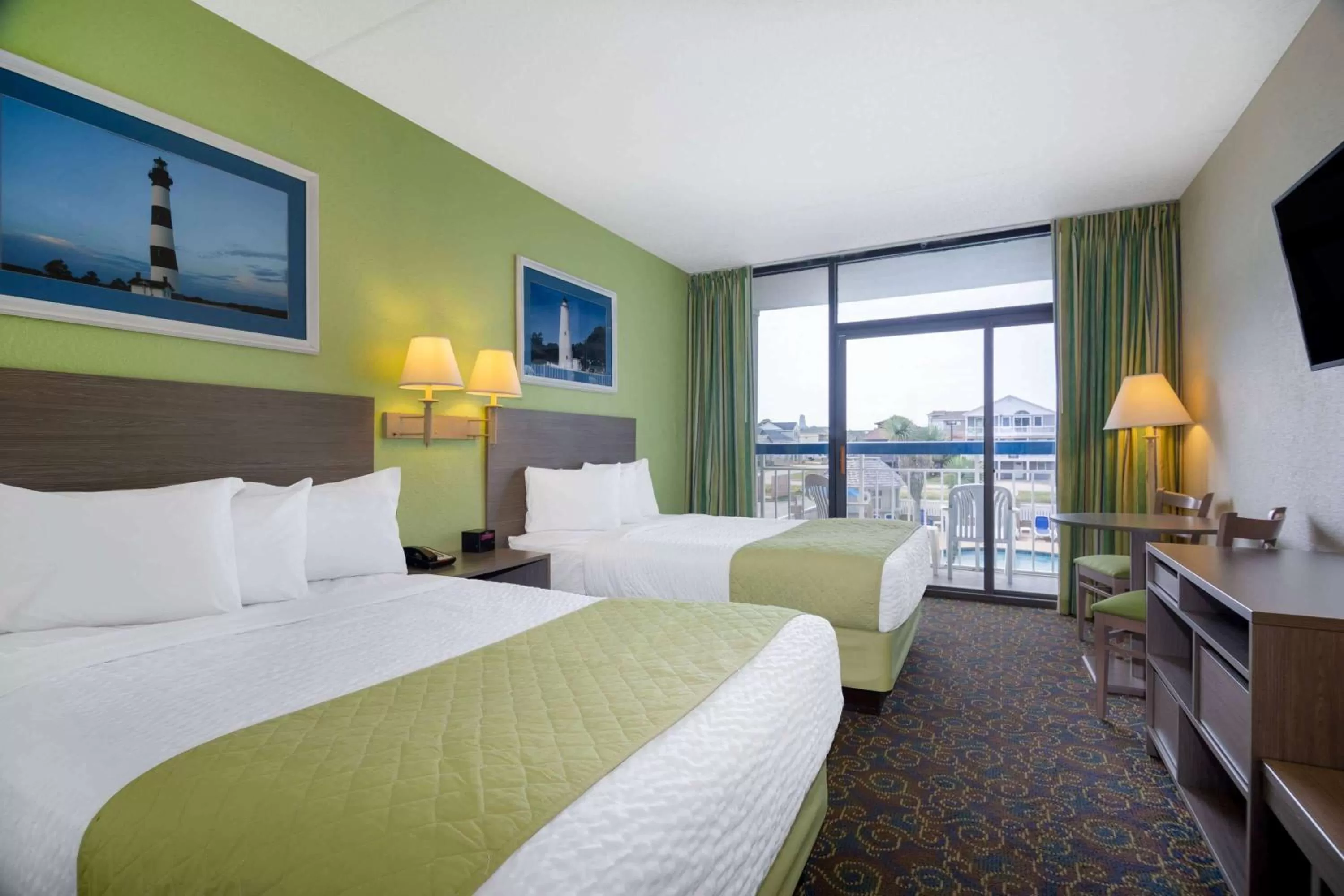 Queen Room with Two Queen Beds with Pool View- Smoking  in Travelodge by Wyndham Outer Banks/Kill Devil Hills