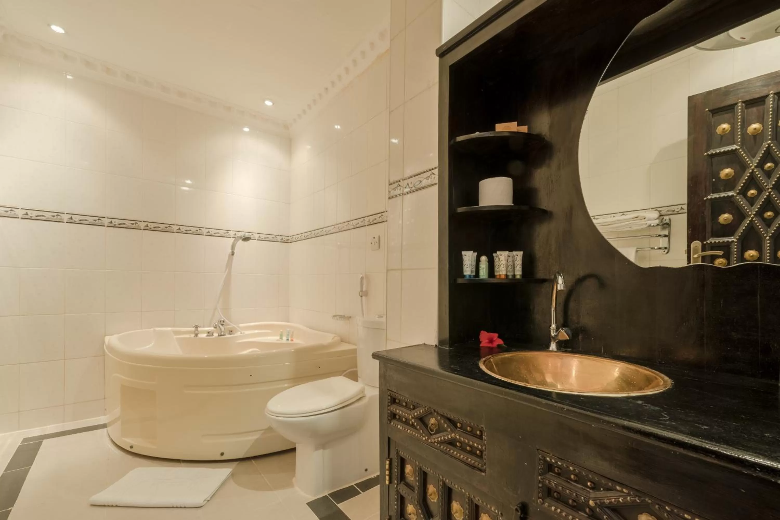 Junior King Suite with Living Room and Jacuzzi in Golden Tulip Stone Town Boutique