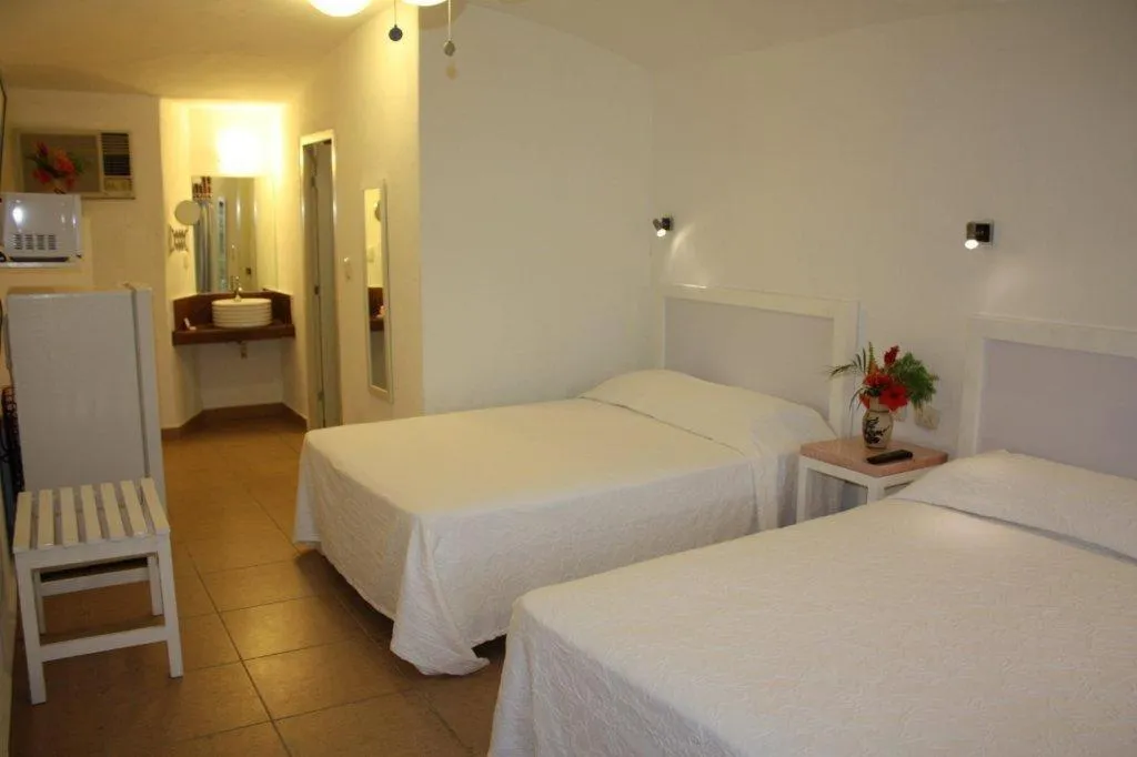 Quadruple Room in Hotel Olinalá Diamante