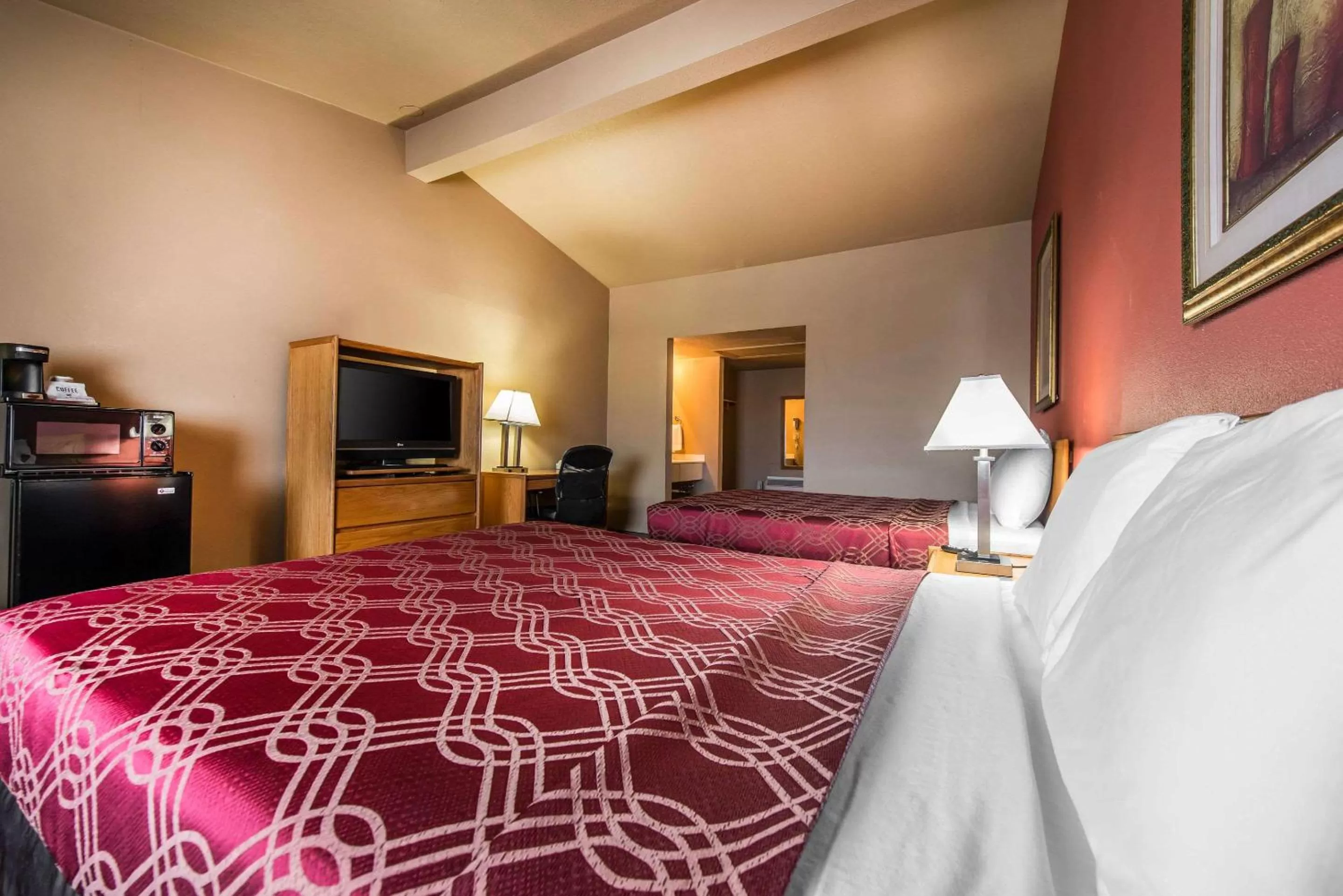 Queen Room with Two Queen Beds - Non-Smoking in Rodeway Inn