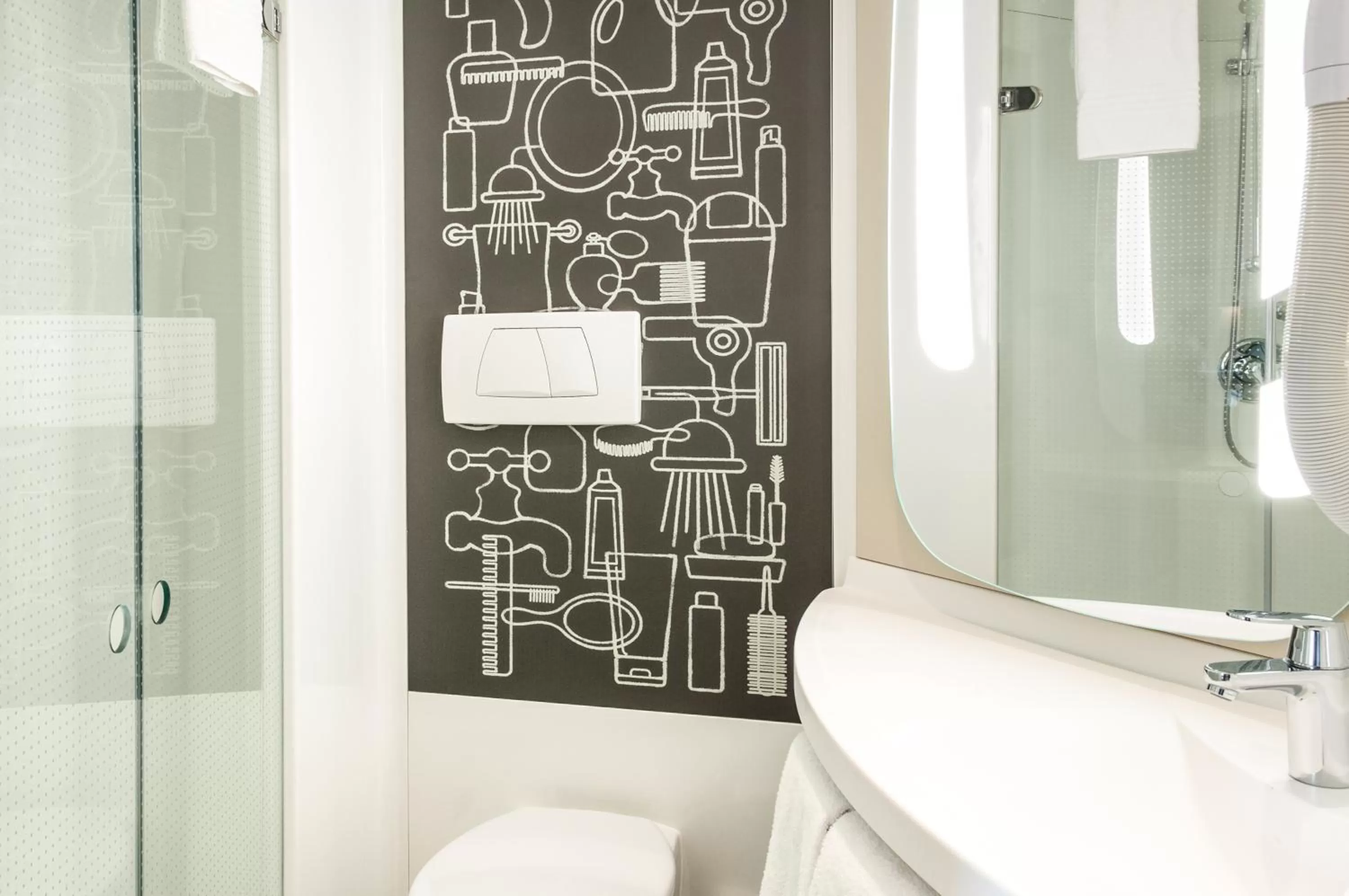 Bathroom in ibis Bern Expo