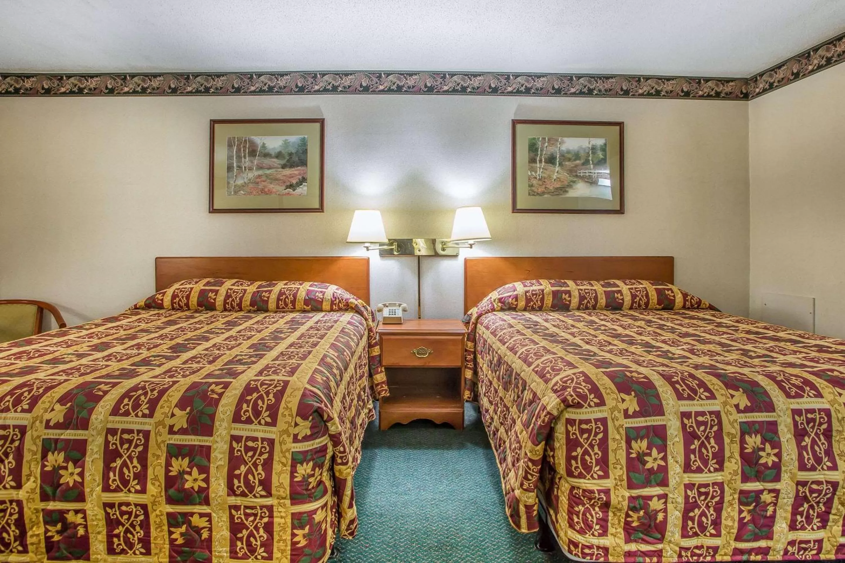 Queen Room with Two Queen Beds - Non-Smoking in Rodeway Inn