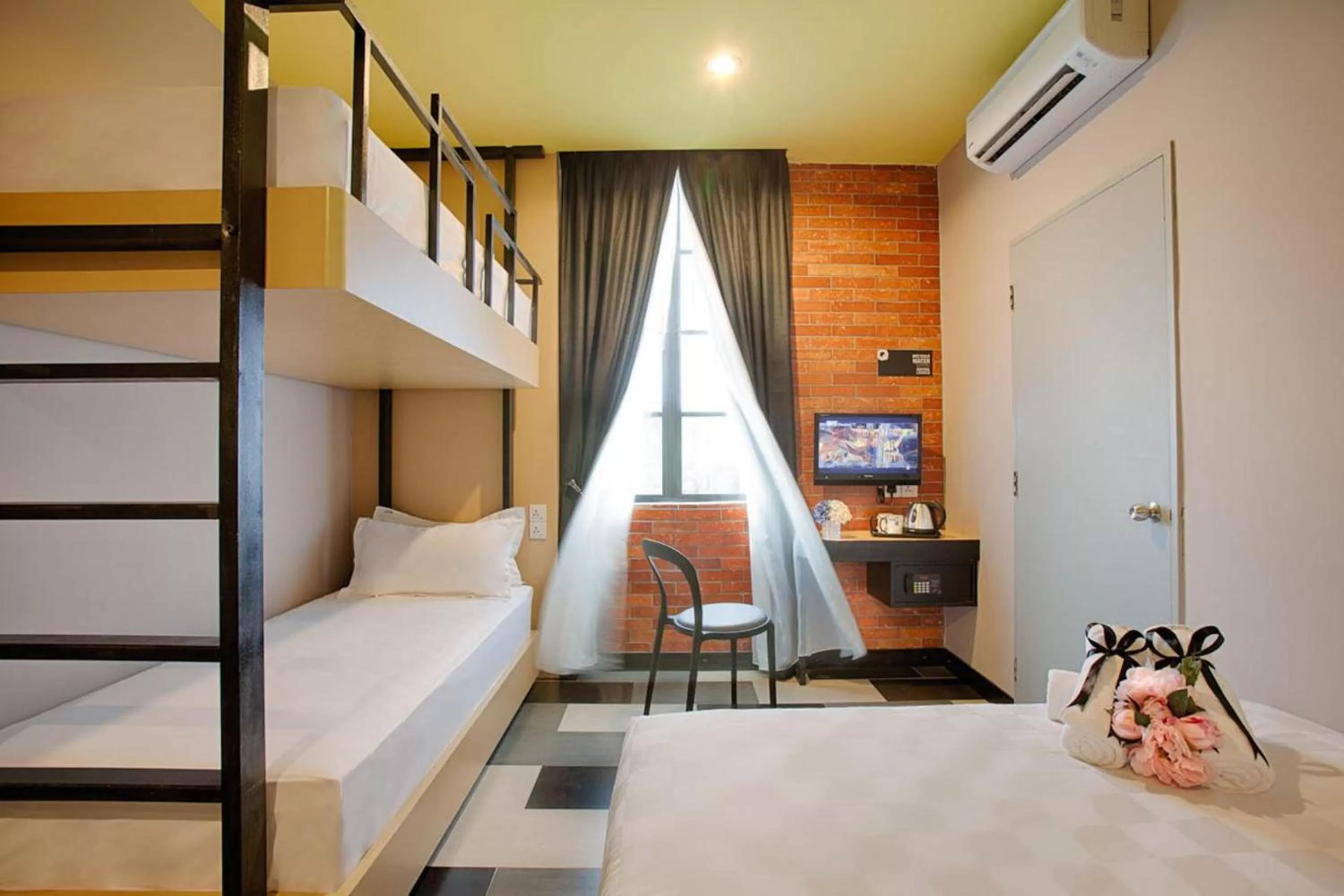 Deluxe Quadruple Room in the youniQ Hotel, Kuala Lumpur International Airport