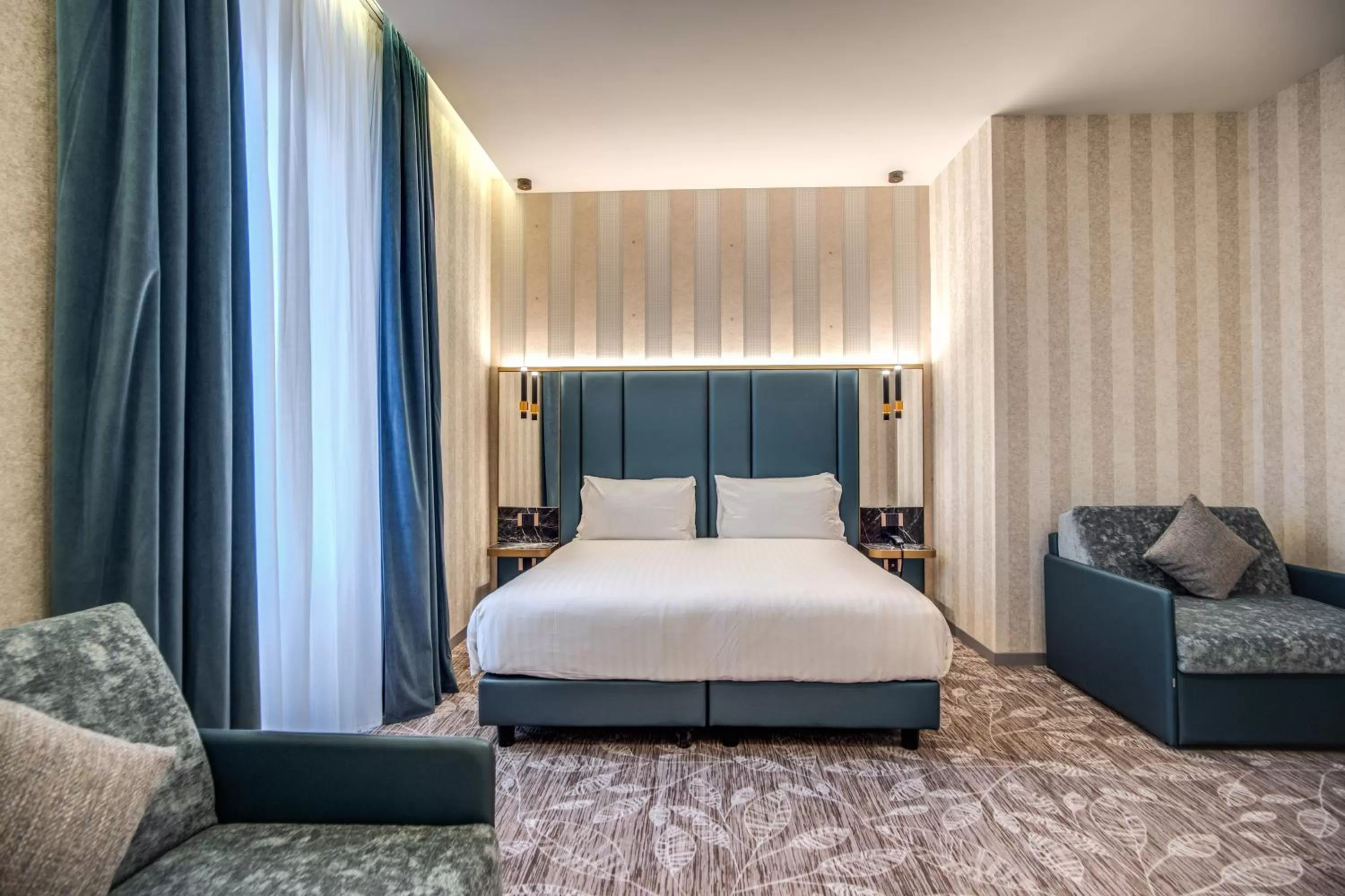 Deluxe Quadruple Room in CC Palace Hotel