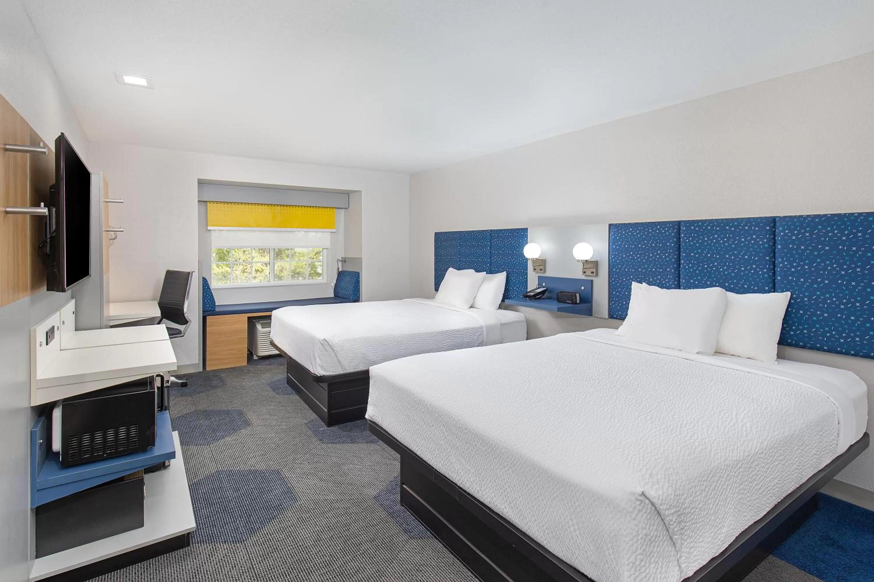Queen Room with Two Queen Beds - Non-Smoking in Microtel Inn & Suites by Wyndham Manchester - Newly Renovated