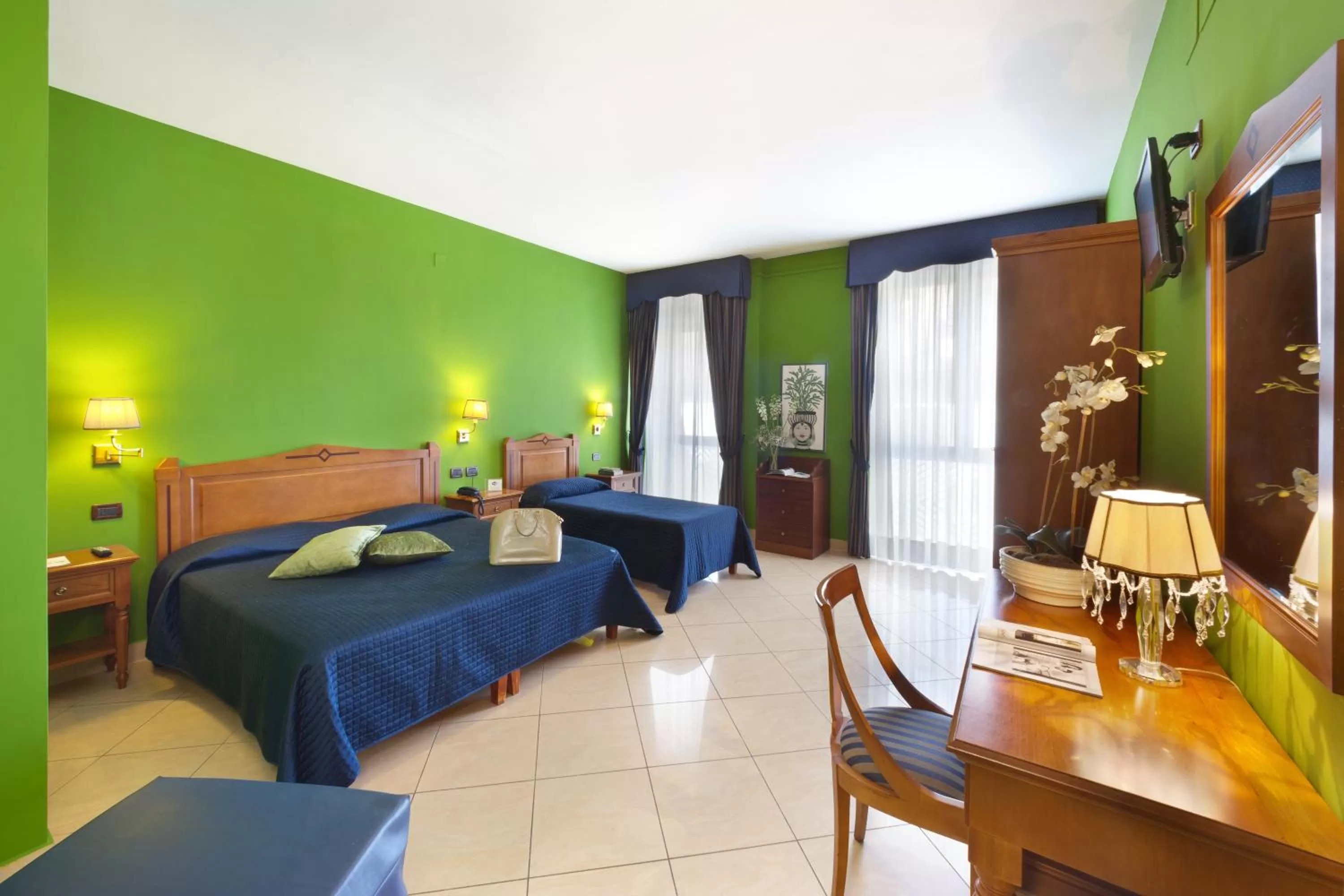 Triple Room in Ulisse Deluxe Hostel