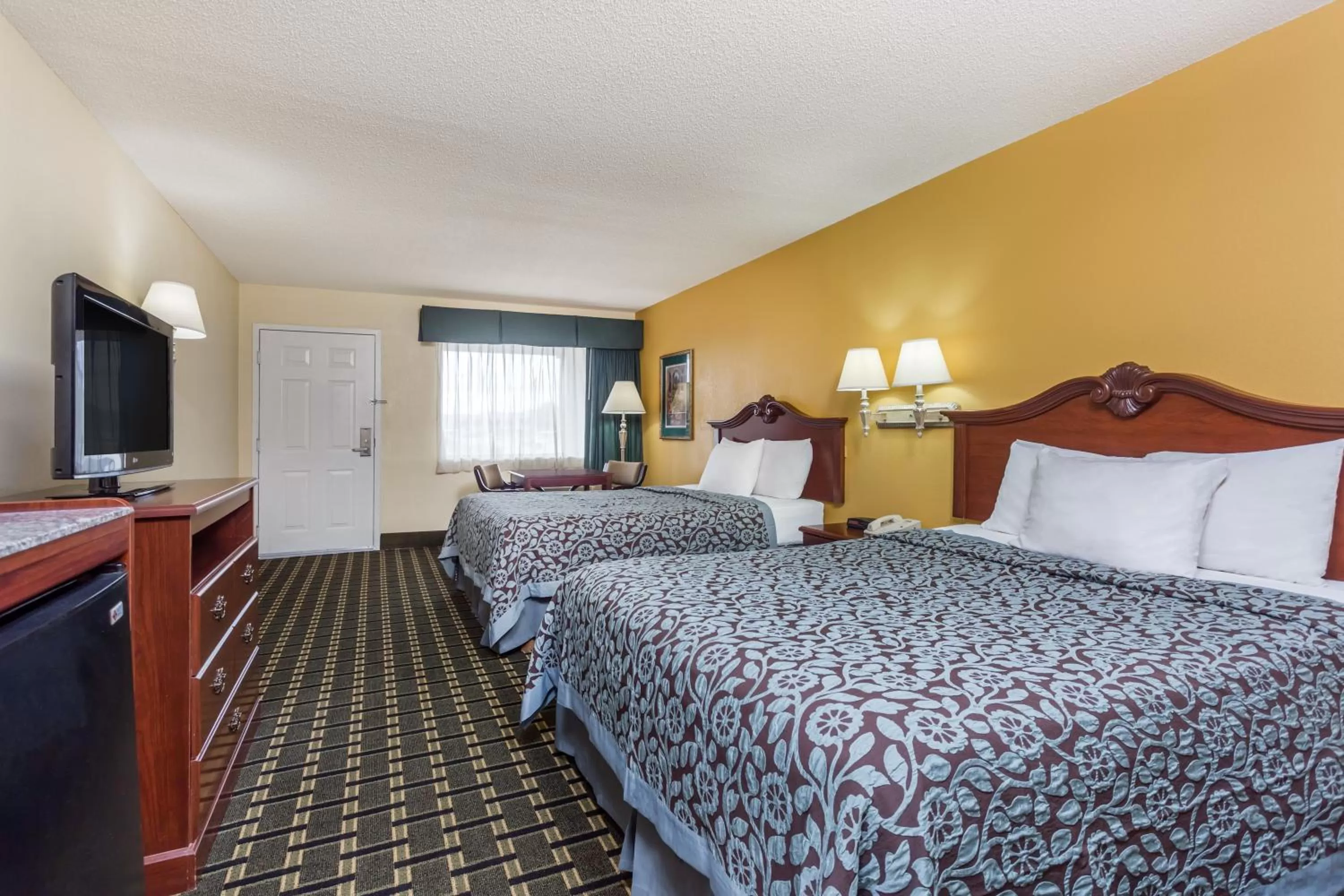 Queen Room with Two Queen Beds - Non-Smoking in Days Inn & Suites by Wyndham Warner Robins Near Robins AFB
