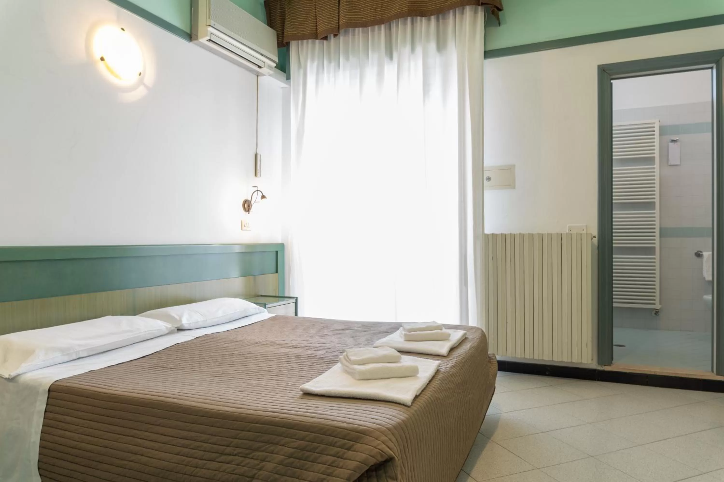 Quadruple Room in Esedra Hotel