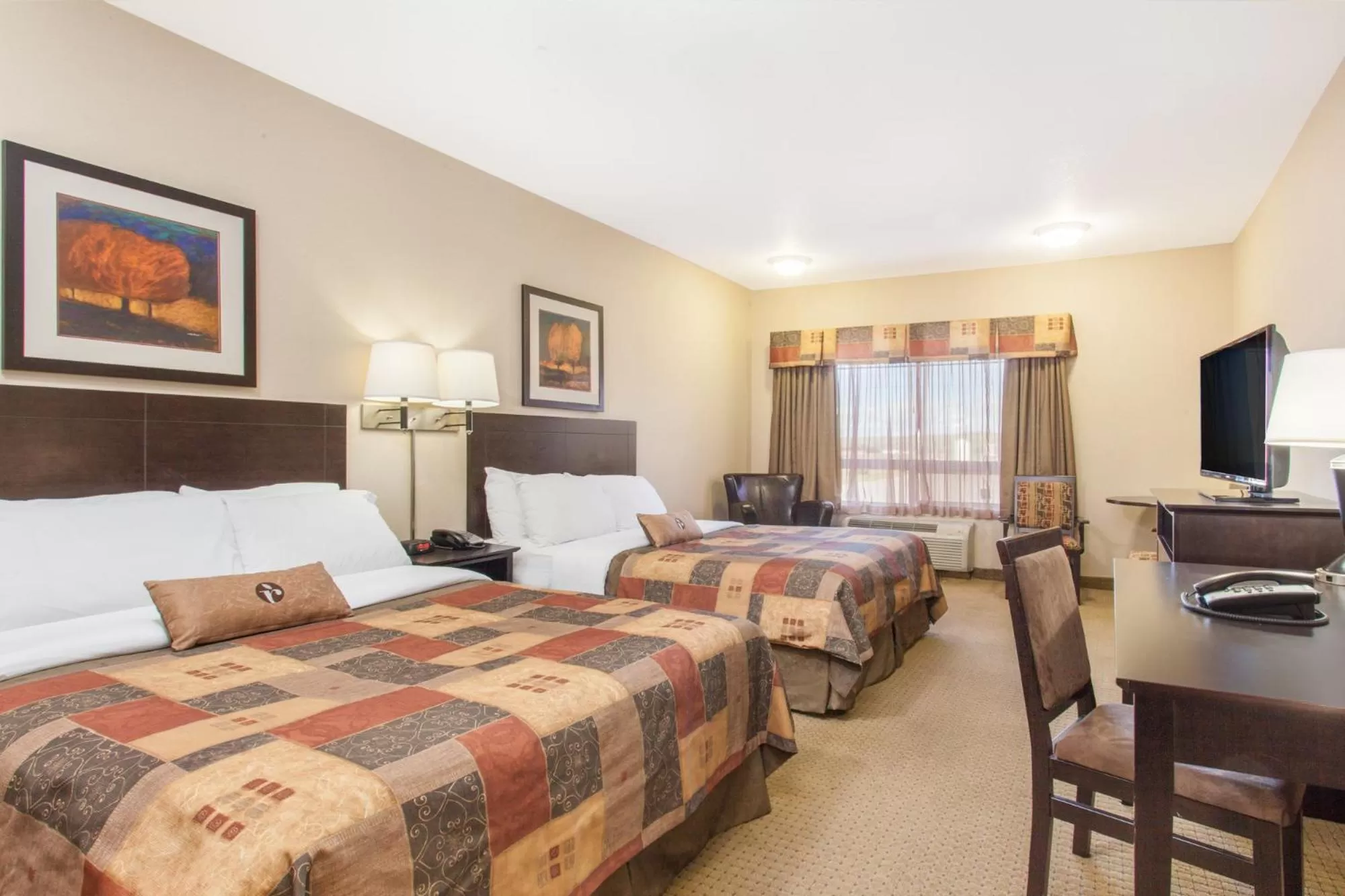 Queen Room with Two Queen Beds - Non-Smoking in Ramada by Wyndham Pincher Creek
