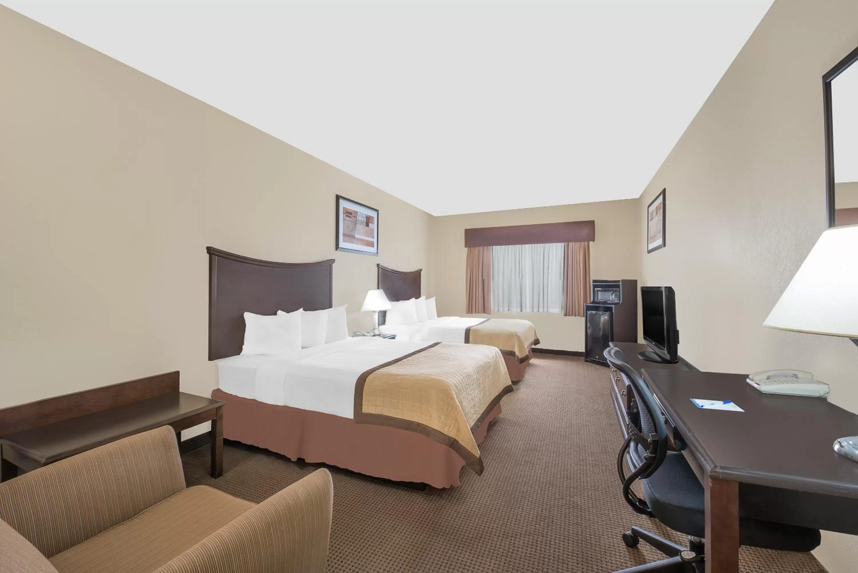 Efficiency Queen Room with Two Queen Beds - Non-Smoking in Baymont by Wyndham Snyder