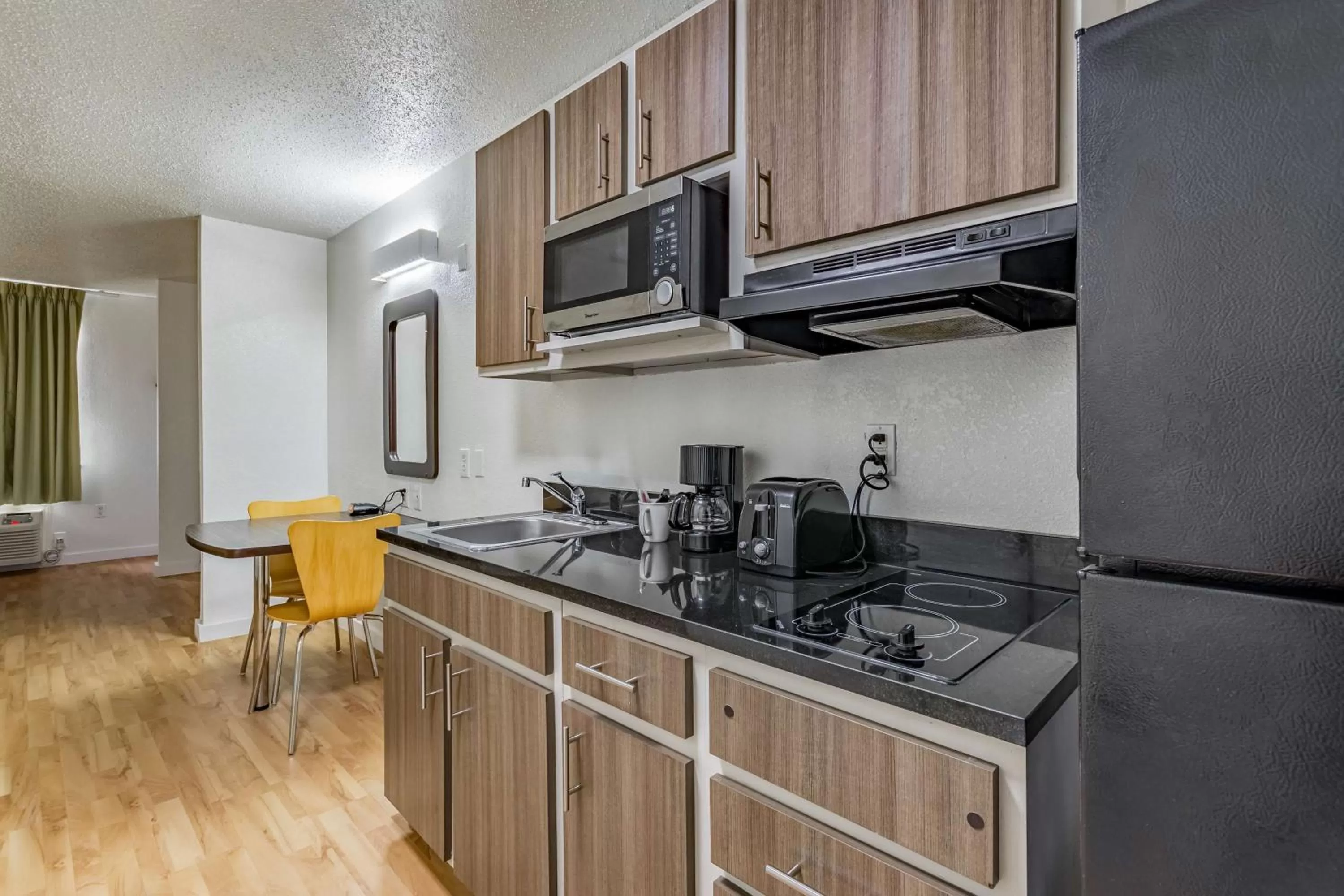 Deluxe King Suite - single occupancy - Non-Smoking in Studio 6-Dallas, TX