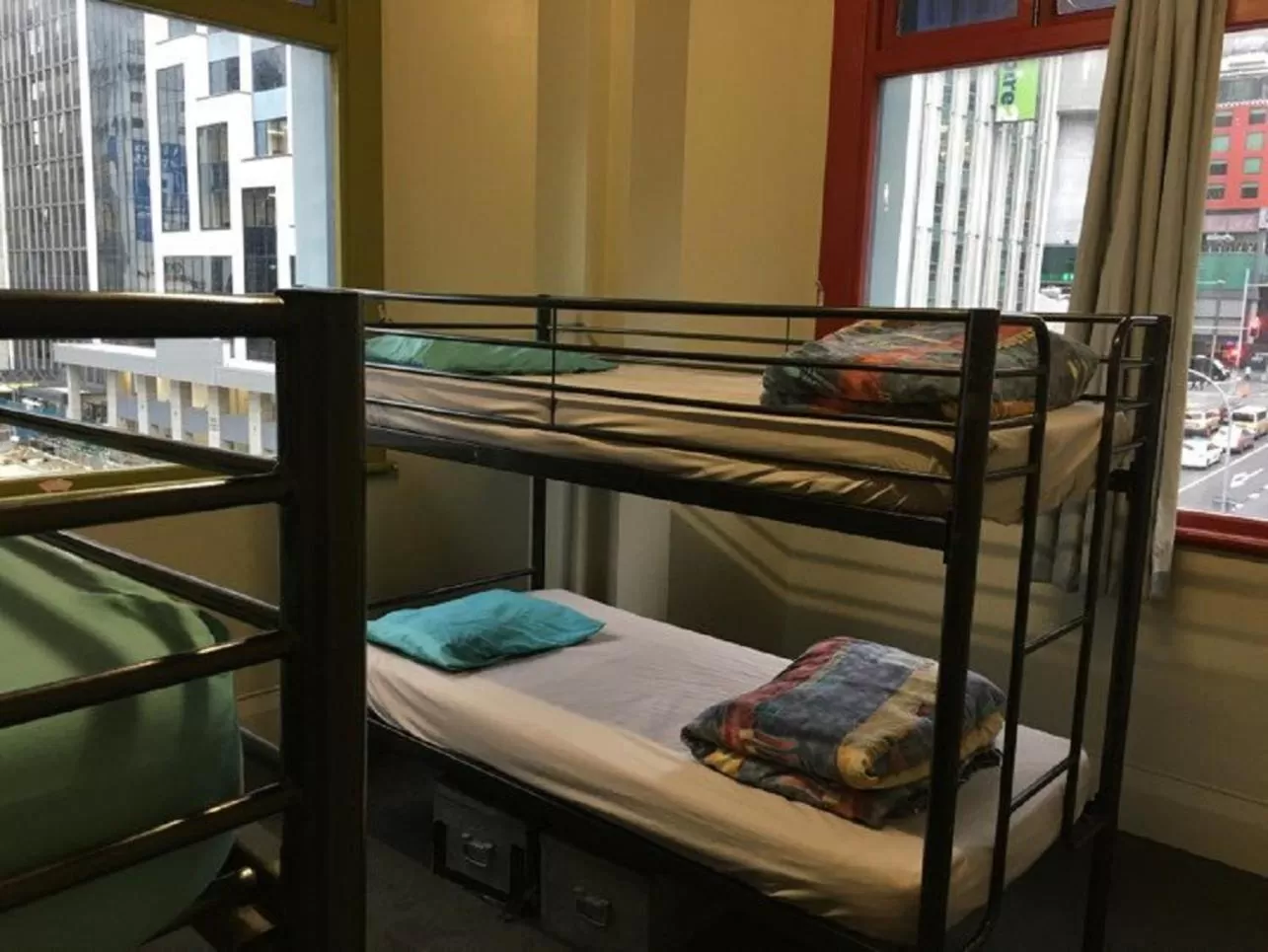 Single Bed in 4-Bed Dormitory Room in Surf 'N' Snow Backpackers Across Sky Tower