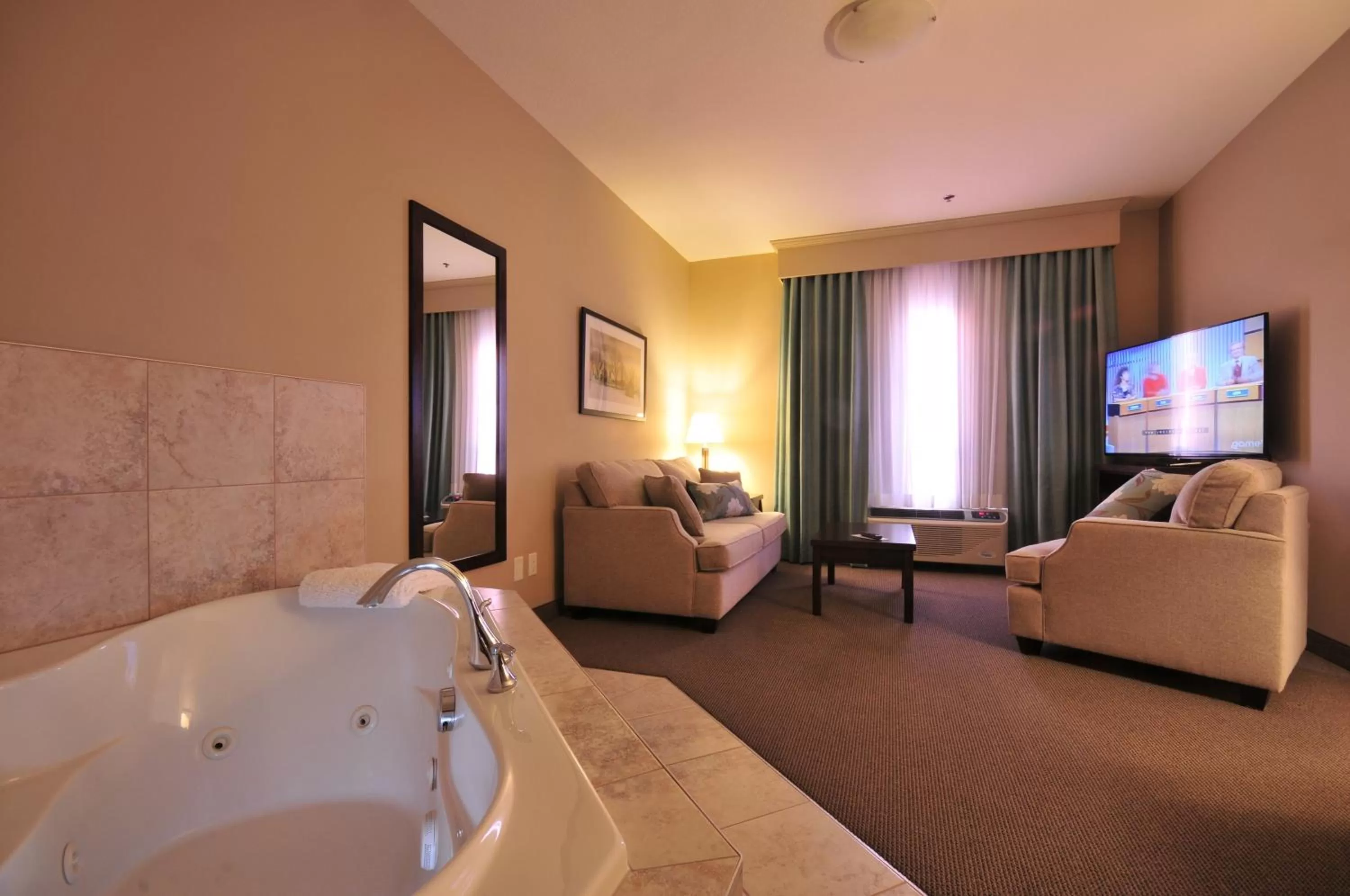 One-Bedroom King Suite with Jetted Tub in Ramada by Wyndham Emerald Park/Regina East