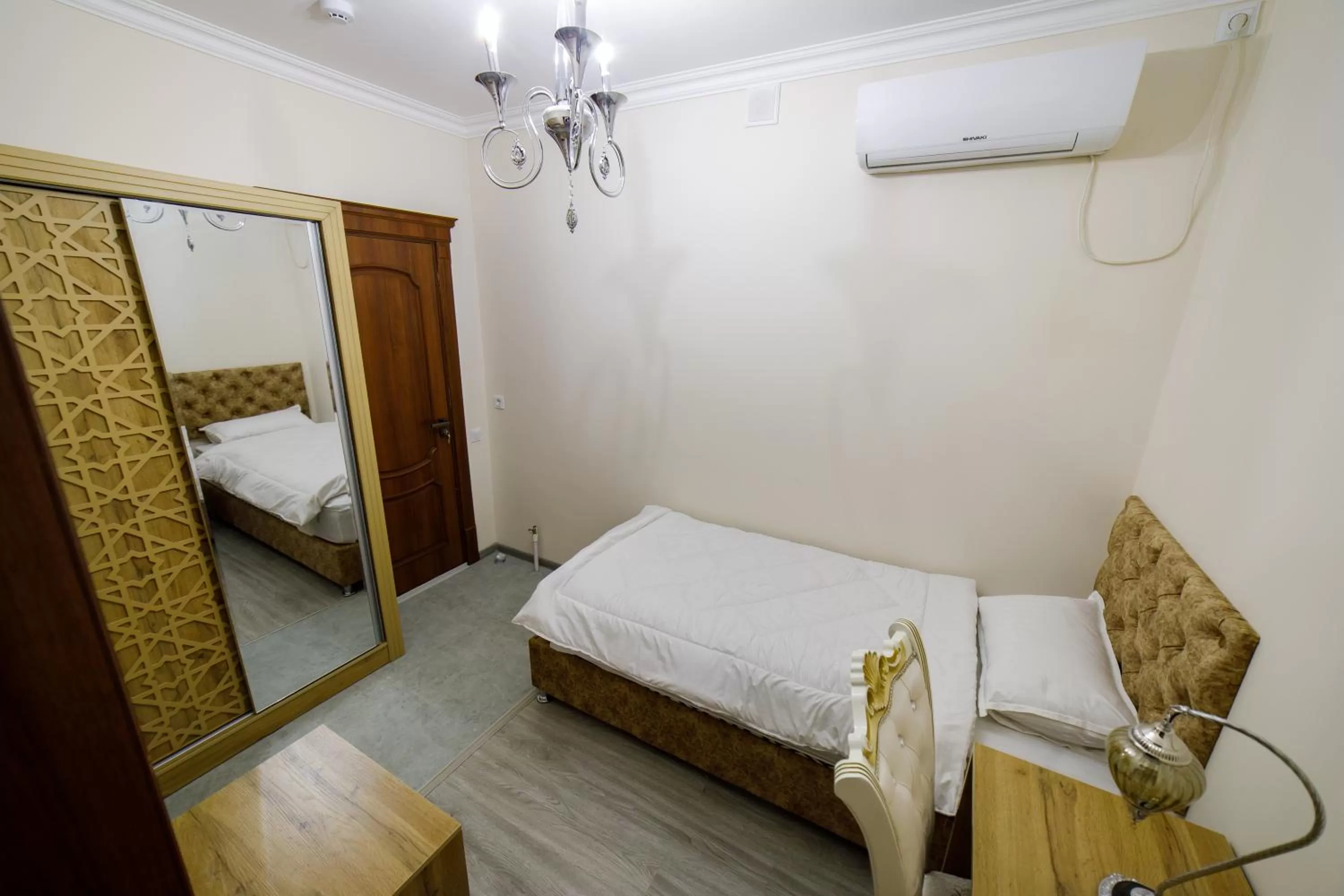Standard Single Room with Shower - single occupancy in Khans Palace Hotel